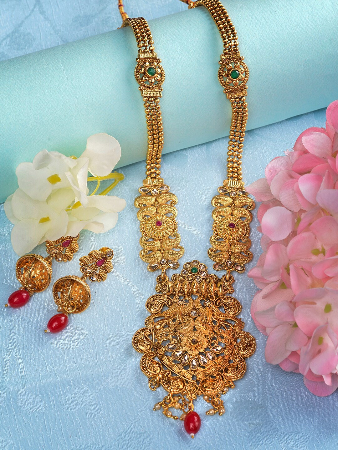 Saraf RS Jewellery Gold-Plated Stone-Studded & beaded Peacock Design Long Jewellery Set
Saraf RS Jewellery Gold-Plated Stone-Studded & beaded Peacock Design Long Jewellery Set