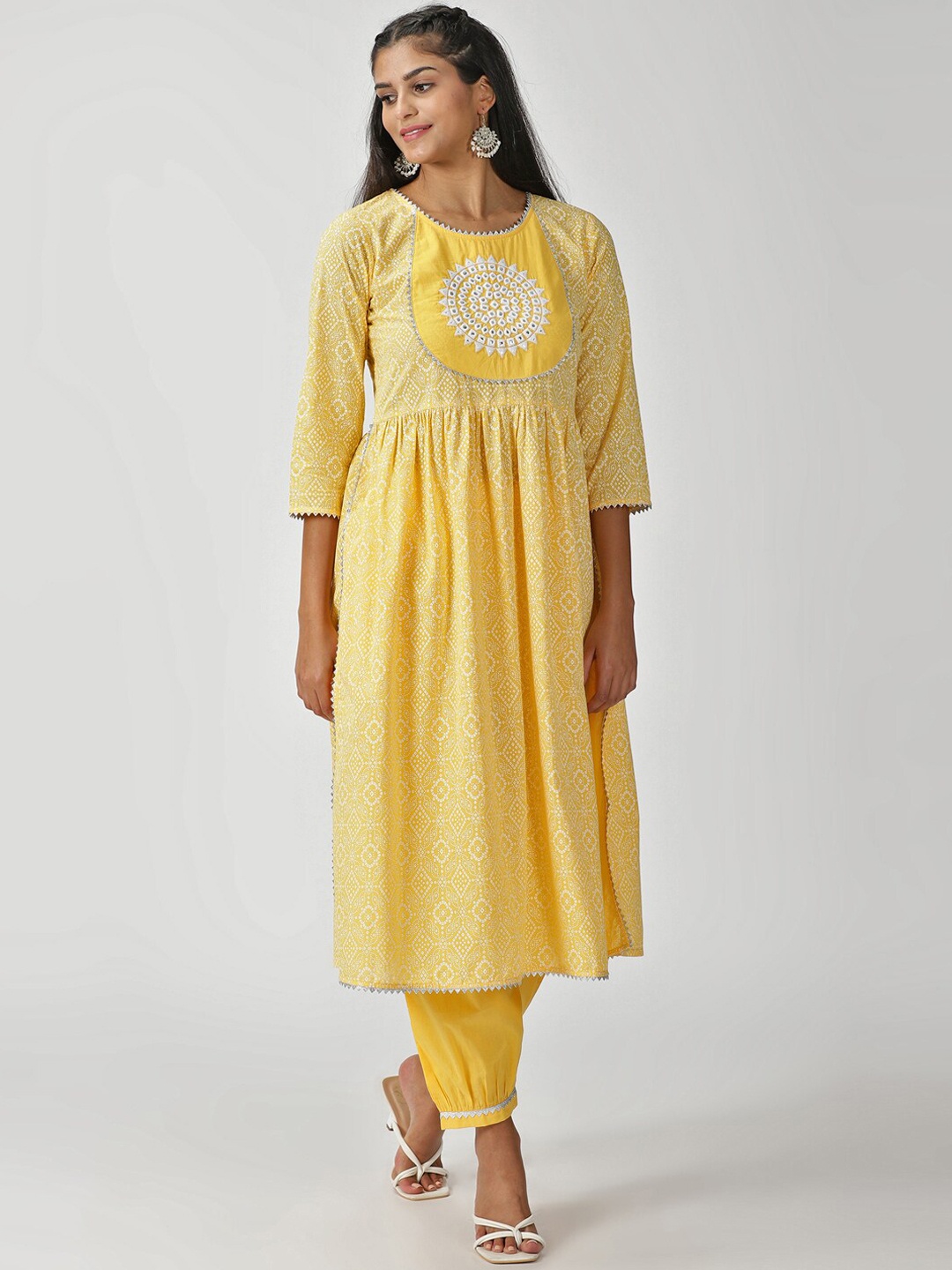 Saffron Threads Bandhani Printed Gathered Mirror Work Pure Cotton Kurta with Salwar, Yellow
Saffron Threads Bandhani Printed Gathered Mirror Work Pure Cotton Kurta with Salwar, Yellow
