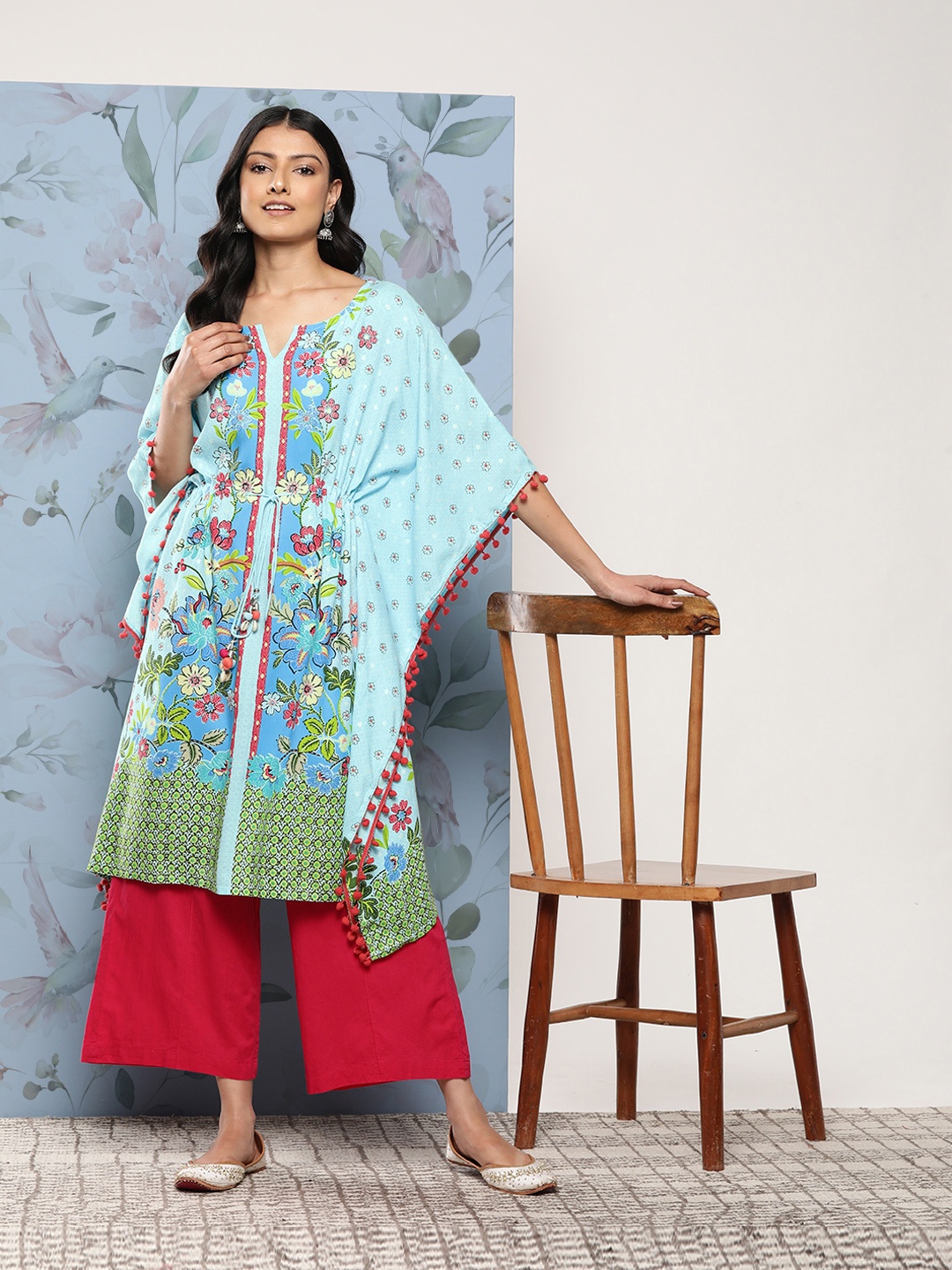Juniper Floral Printed Flared Sleeves Kaftan Kurta with Pom Pom & Tie-Up Detail, Blue
Juniper Floral Printed Flared Sleeves Kaftan Kurta with Pom Pom & Tie-Up Detail, Blue