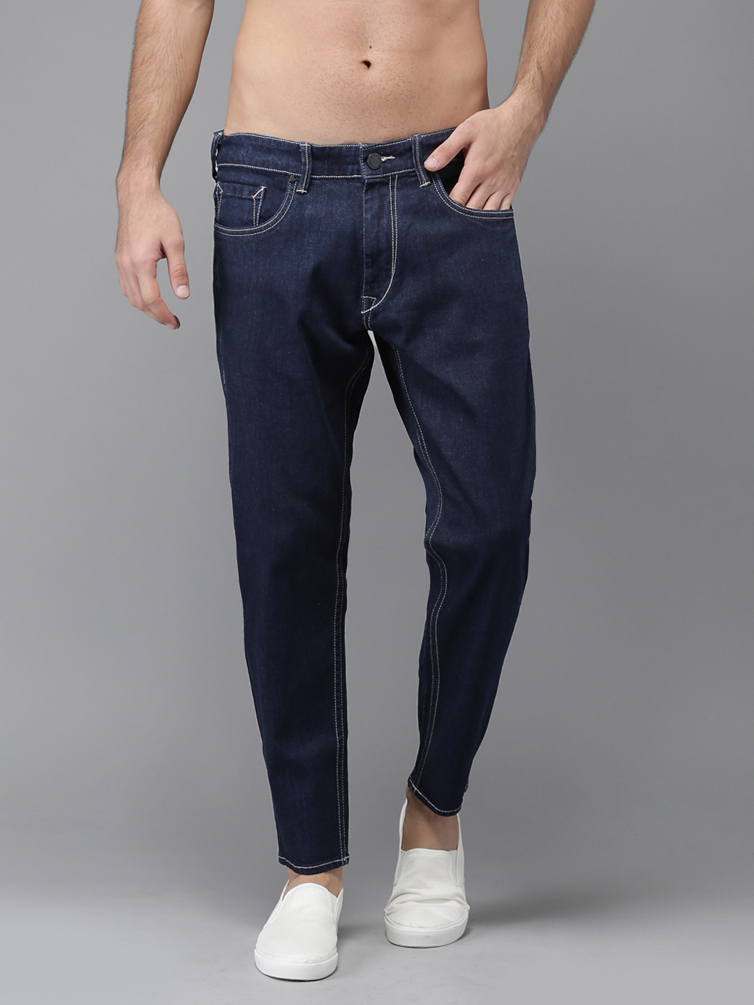 HERE&NOW Men Blue Slim Tapered Fit Mid-Rise Clean Look Stretchable Ankle-Length Jeans 
HERE&NOW Men Blue Slim Tapered Fit Mid-Rise Clean Look Stretchable Ankle-Length Jeans