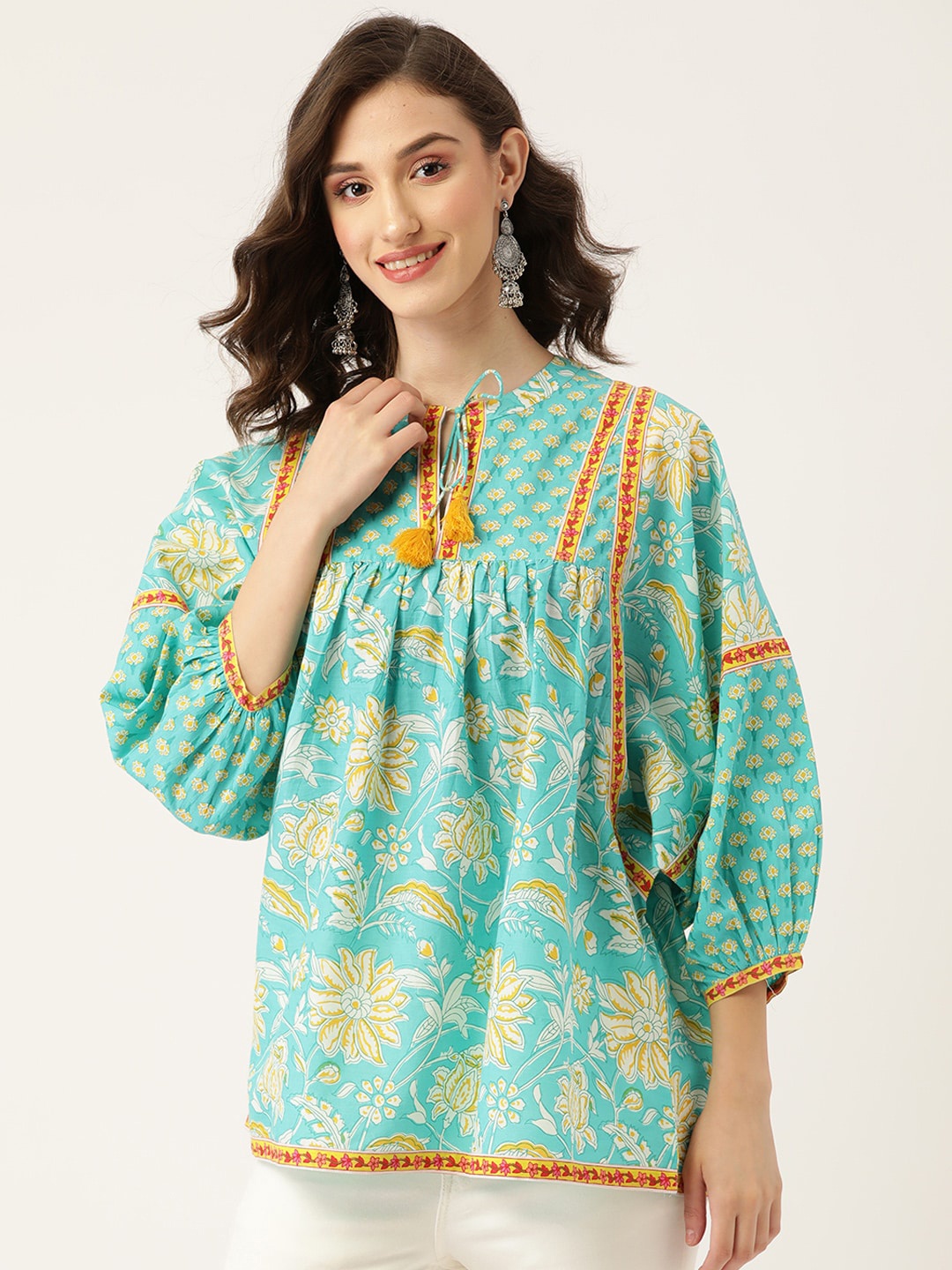 Jaipur Morni Floral Printed Pure Cotton Puff Sleeves Tie-Up Neck Top, Turquoise blue
Jaipur Morni Floral Printed Pure Cotton Puff Sleeves Tie-Up Neck Top, Turquoise blue