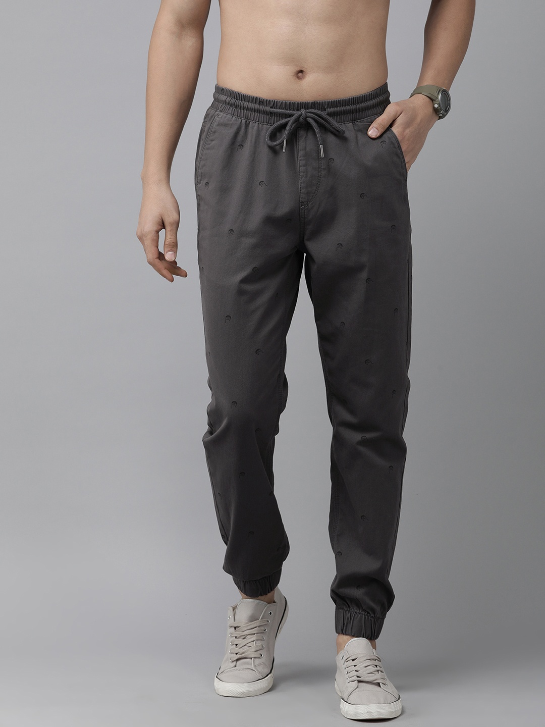 Roadster Men Pure Cotton Conversational Printed Pleated Joggers Trousers, Grey
Roadster Men Pure Cotton Conversational Printed Pleated Joggers Trousers, Grey