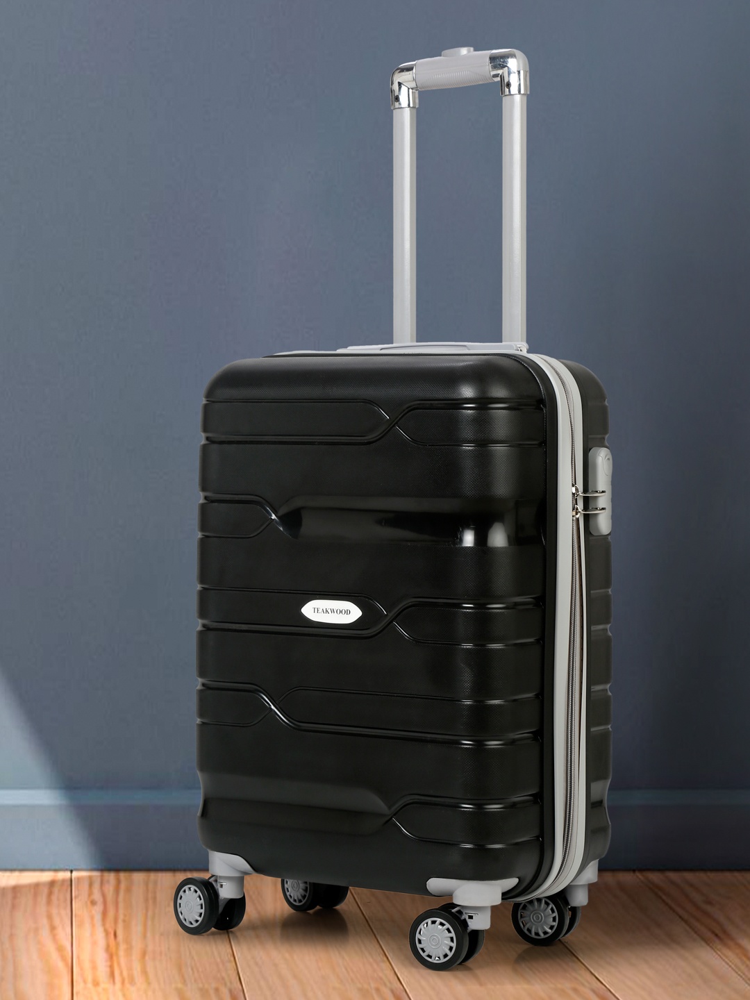 Teakwood Leathers Textured 360 Degree Rotation Hard Cabin-Sized Trolley Bag -55 CM, Black
Teakwood Leathers Textured 360 Degree Rotation Hard Cabin-Sized Trolley Bag -55 CM, Black