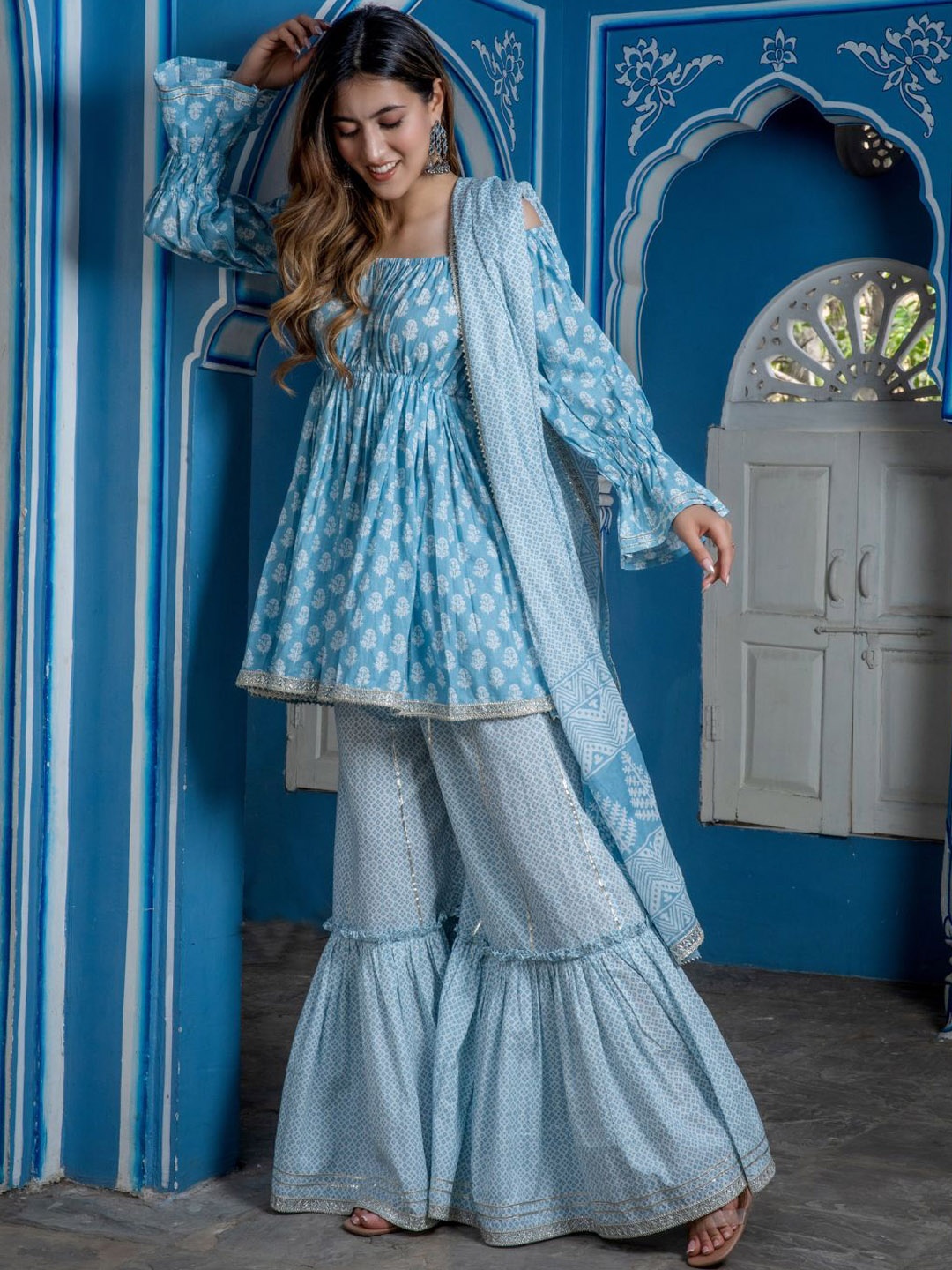 HOUSE OF JAMOTI Women Printed Off Shoulder Pure Cotton Kurta with Sharara & Dupatta, Blue
HOUSE OF JAMOTI Women Printed Off Shoulder Pure Cotton Kurta with Sharara & Dupatta, Blue