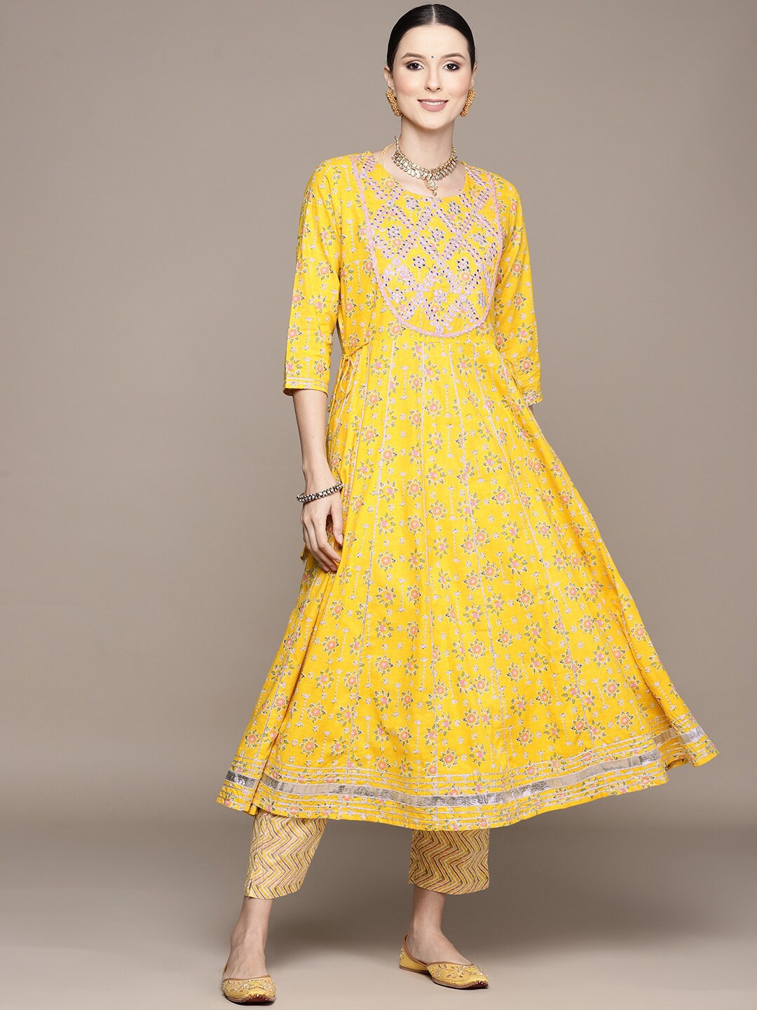 Ishin Women Ethnic Print Mirror Work Pure Cotton Anarkali Kurta with Trousers, Mustard
Ishin Women Ethnic Print Mirror Work Pure Cotton Anarkali Kurta with Trousers, Mustard