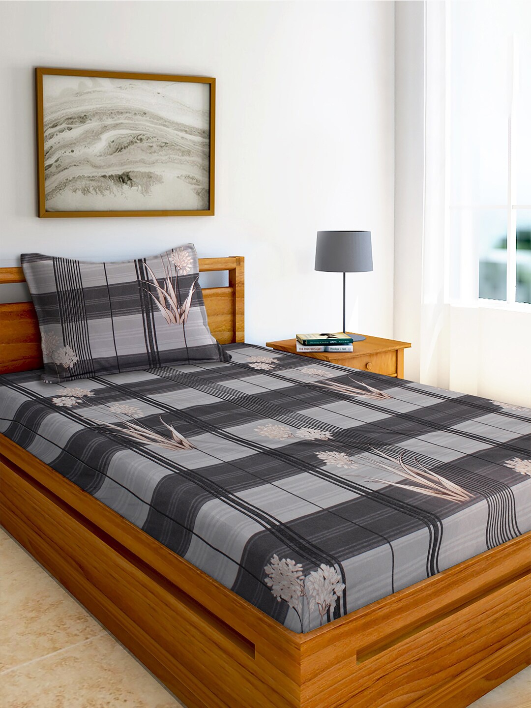 AEROHAVEN Grey & Black Geometric 210 TC Flat Cotton Single Bedsheet with 1 Pillow Cover
AEROHAVEN Grey & Black Geometric 210 TC Flat Cotton Single Bedsheet with 1 Pillow Cover