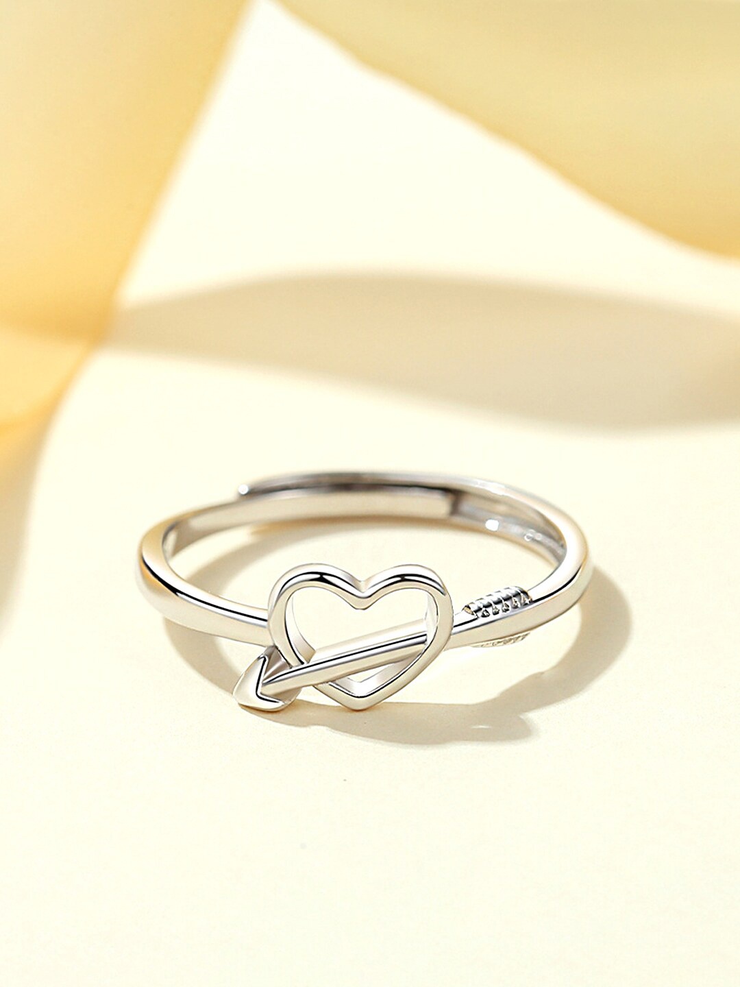Raajsi by Yellow Chimes 925 Sterling Silver-Plated Heart Shaped Adjustable Finger Ring
Raajsi by Yellow Chimes 925 Sterling Silver-Plated Heart Shaped Adjustable Finger Ring