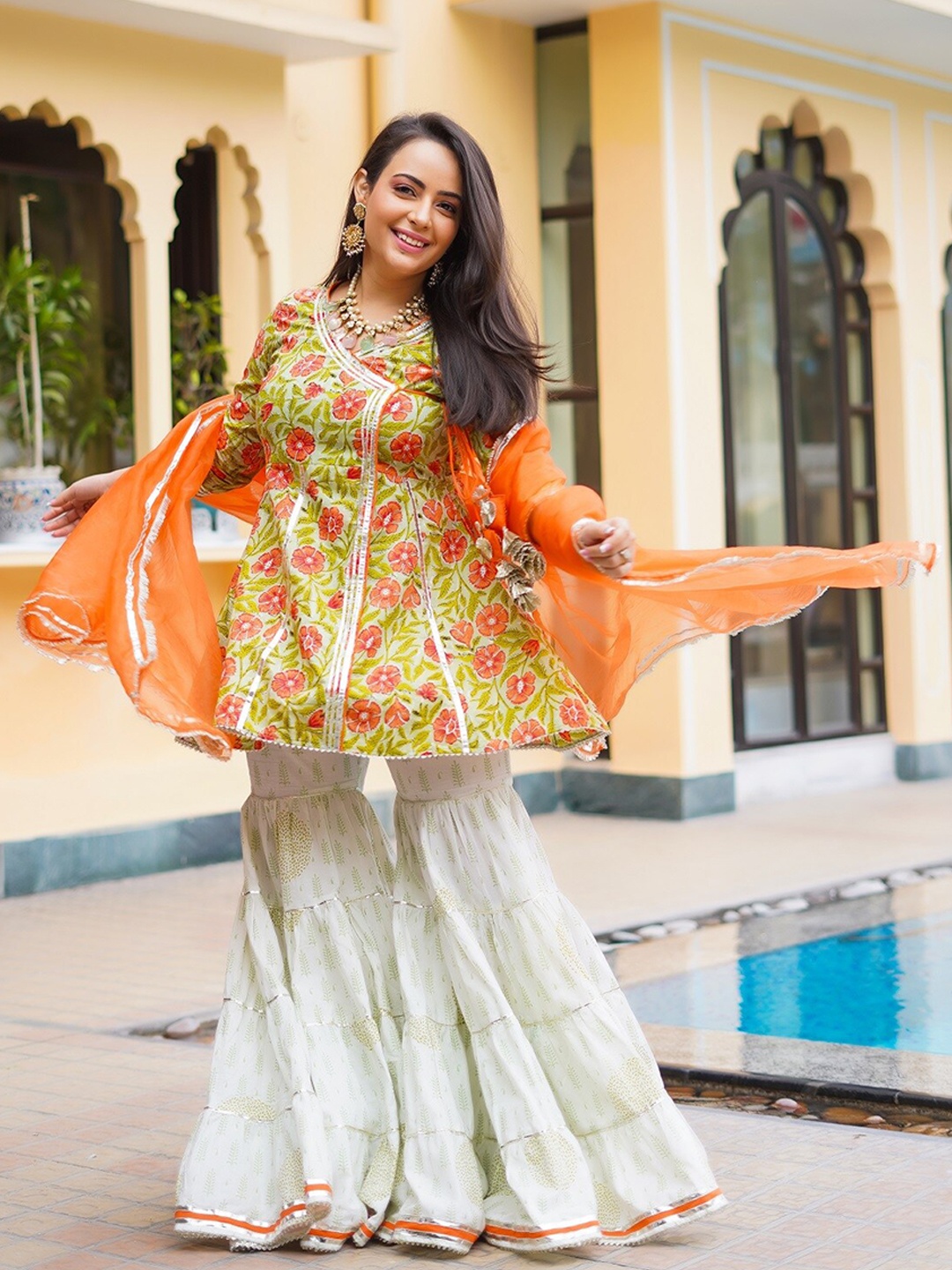 PINKVILLE JAIPUR Women Floral Printed Angrakha Gotta Patti Pure Cotton Kurta with Sharara, White
PINKVILLE JAIPUR Women Floral Printed Angrakha Gotta Patti Pure Cotton Kurta with Sharara, White