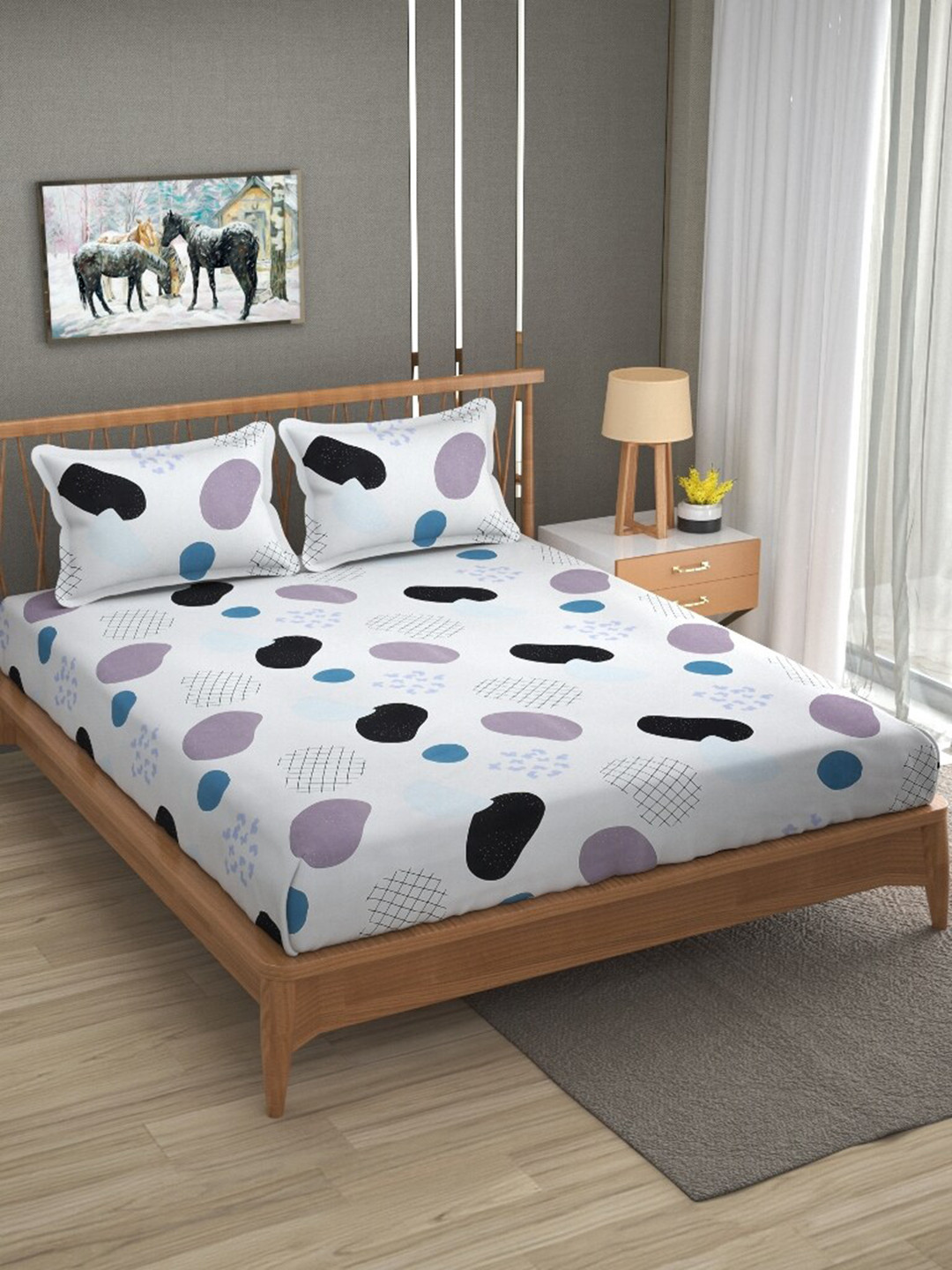 Molly & Michel White & Purple Printed 210 TC Queen Fitted Bedsheet with 2 Pillow Covers
Molly & Michel White & Purple Printed 210 TC Queen Fitted Bedsheet with 2 Pillow Covers