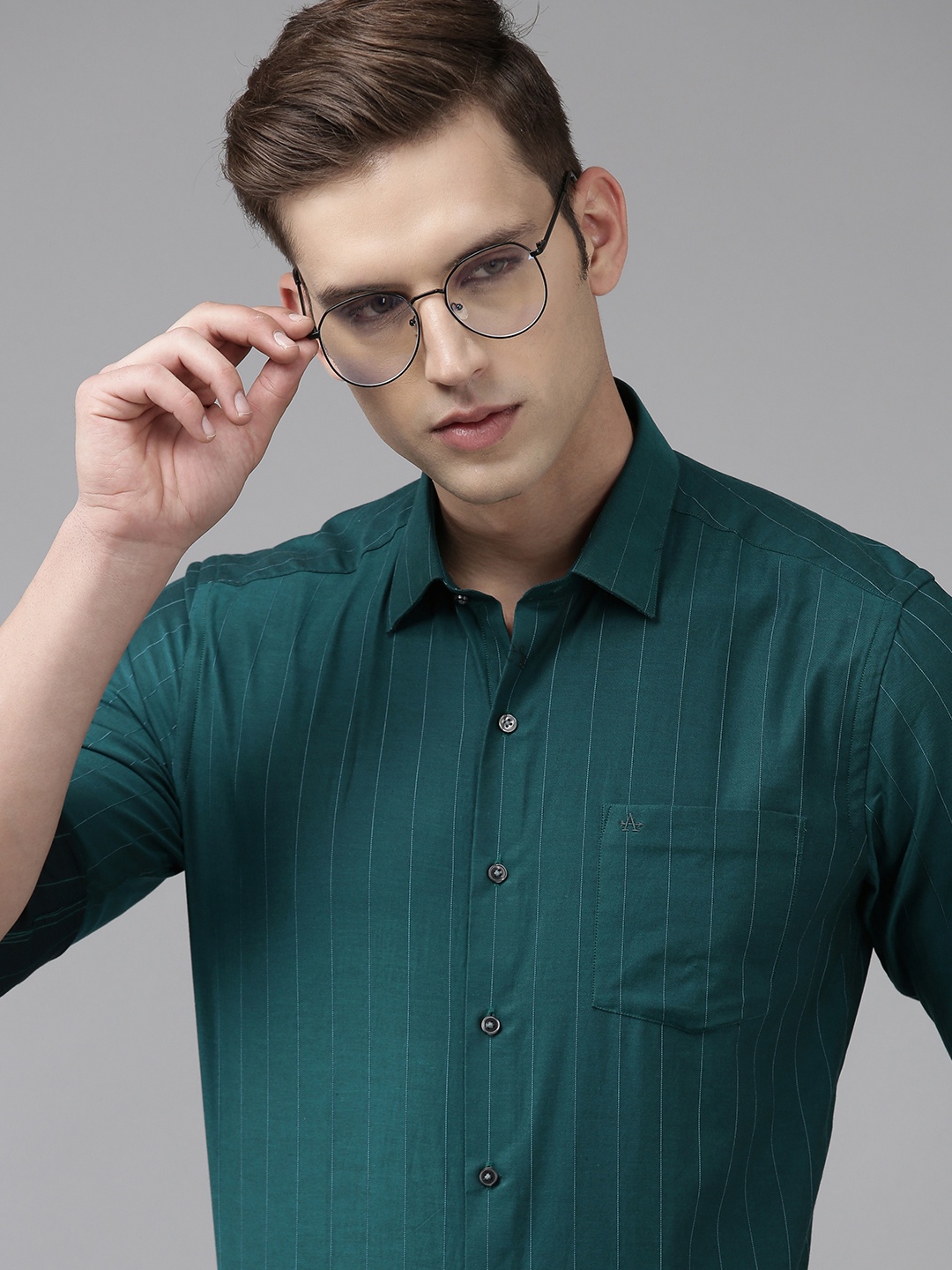 Arrow Manhattan Slim Fit Pinstripes Opaque Pure Cotton Formal Shirt With Chest Pocket, Teal
Arrow Manhattan Slim Fit Pinstripes Opaque Pure Cotton Formal Shirt With Chest Pocket, Teal