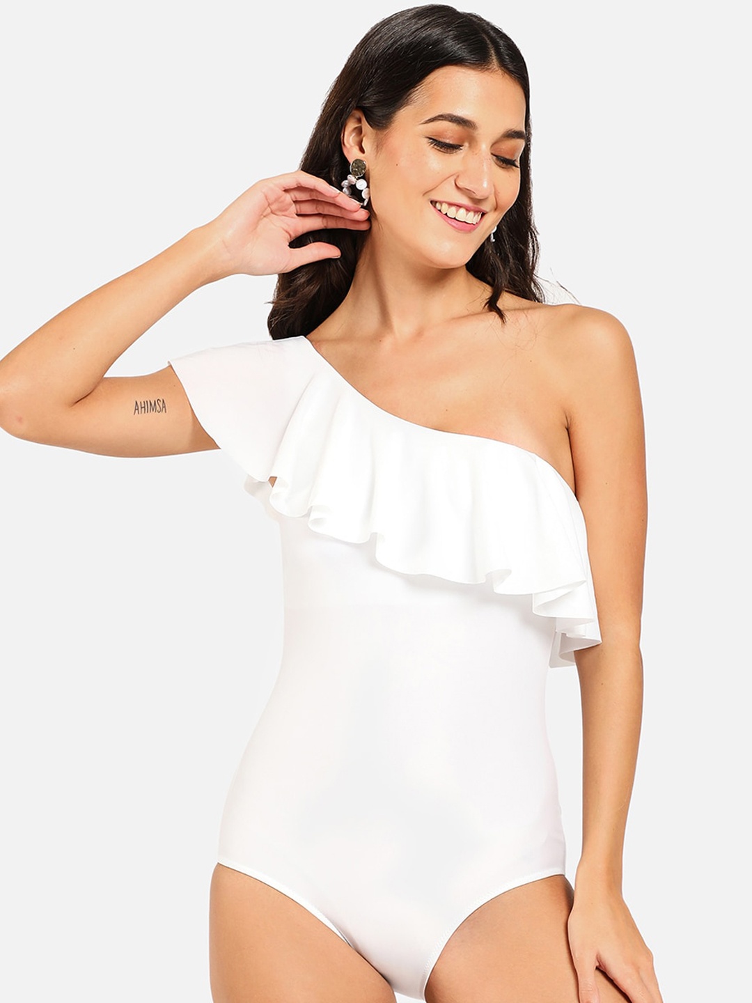 HAUTE SAUCE by Campus Sutra Women Ruffle Design One-Shoulder One-Piece Swimsuit, White
HAUTE SAUCE by Campus Sutra Women Ruffle Design One-Shoulder One-Piece Swimsuit, White