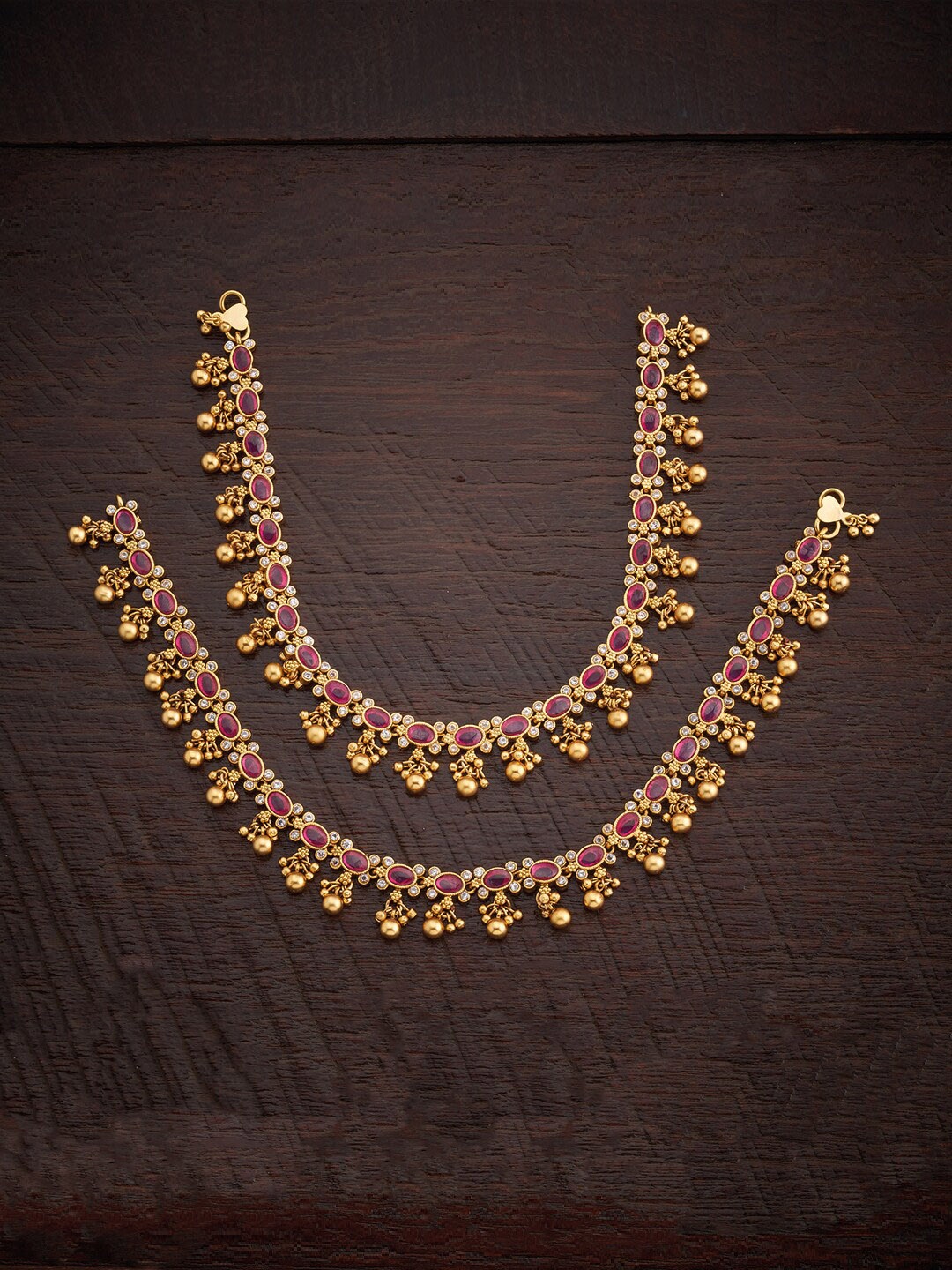 Kushal's Fashion Jewellery Set of 2 Gold Plated Stone-Studded & Beaded Antique Anklets, Red
Kushal's Fashion Jewellery Set of 2 Gold Plated Stone-Studded & Beaded Antique Anklets, Red