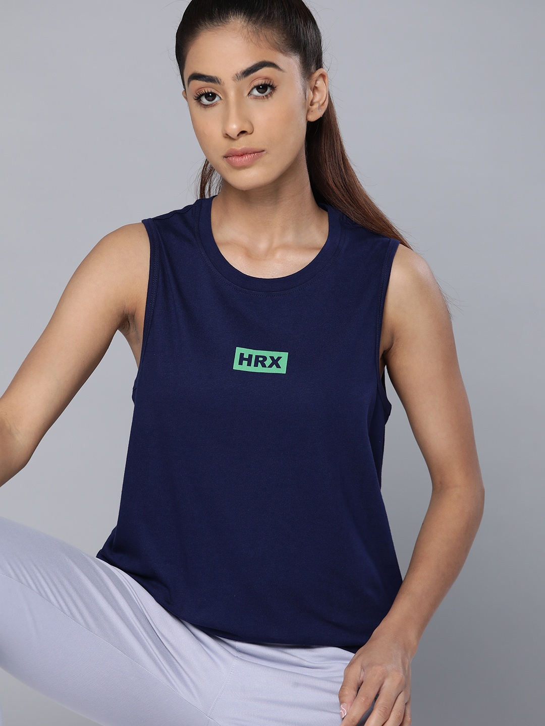 HRX by Hrithik Roshan Women Brand Logo Pure Cotton Sleeveless T-shirt, Navy blue
HRX by Hrithik Roshan Women Brand Logo Pure Cotton Sleeveless T-shirt, Navy blue