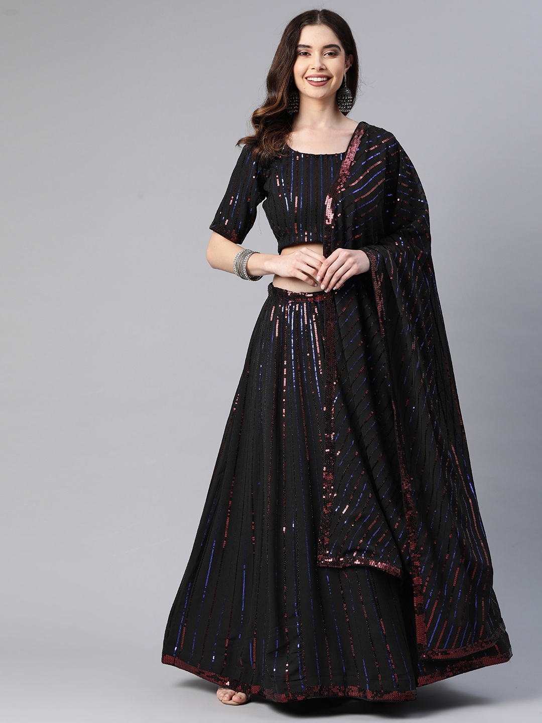 Readiprint Fashions Black Embellished Sequinned Semi-Stitched Lehenga & Unstitched Blouse With Dupatta
Readiprint Fashions Black Embellished Sequinned Semi-Stitched Lehenga & Unstitched Blouse With Dupatta