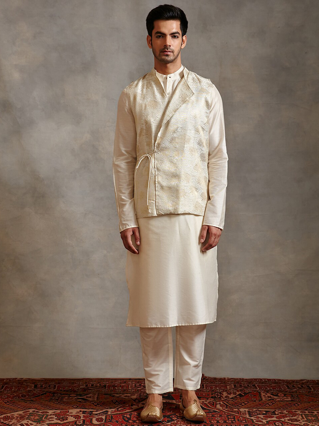 Abhishti Men Mandarin Collar Kurta with Pyjamas & Floral Banarasi Waistcoat, Beige
Abhishti Men Mandarin Collar Kurta with Pyjamas & Floral Banarasi Waistcoat, Beige