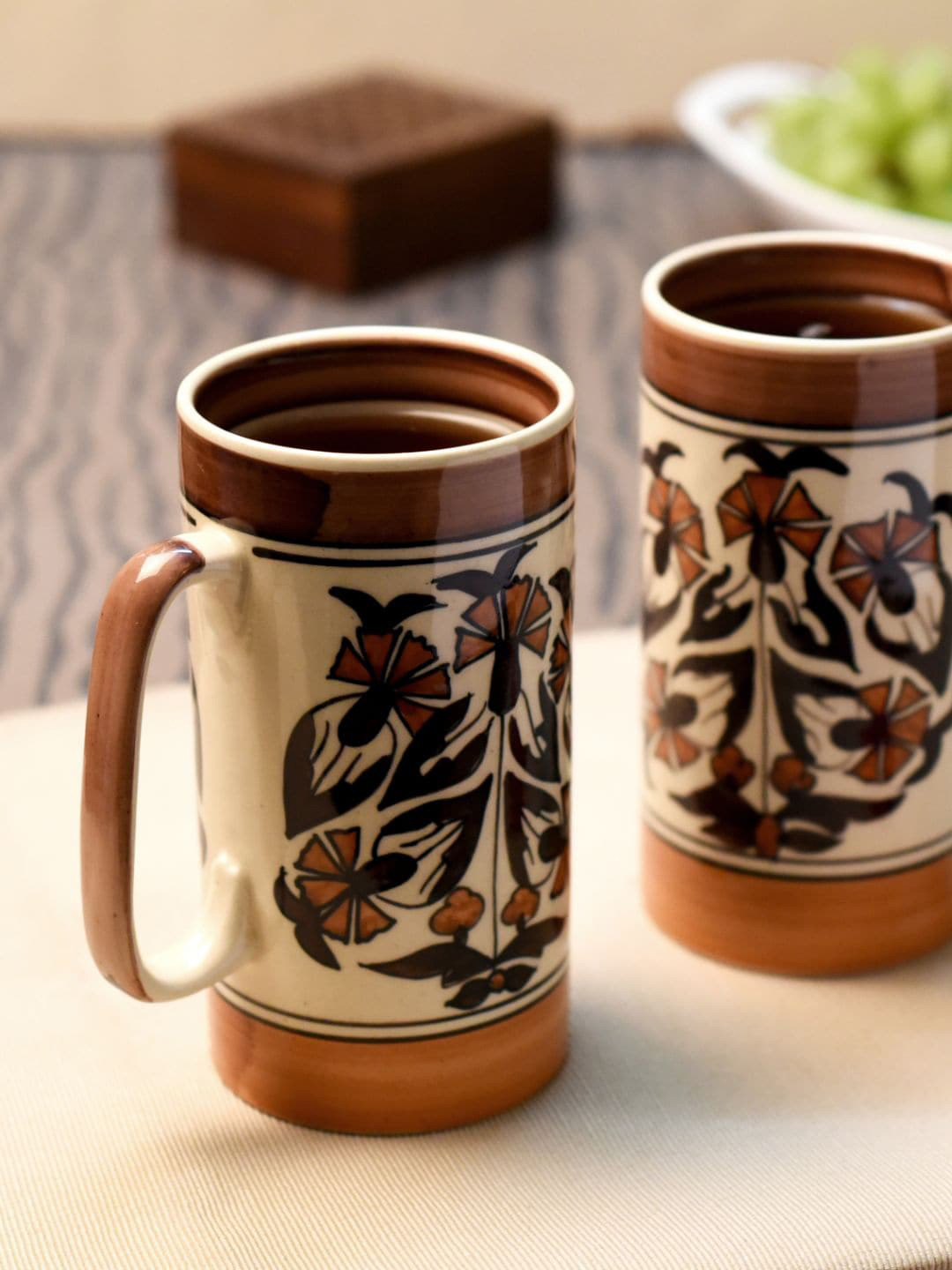 Unravel India Brown & White 2 Pcs Floral Printed Ceramic Matte Mugs 300 ml Each
Unravel India Brown & White 2 Pcs Floral Printed Ceramic Matte Mugs 300 ml Each