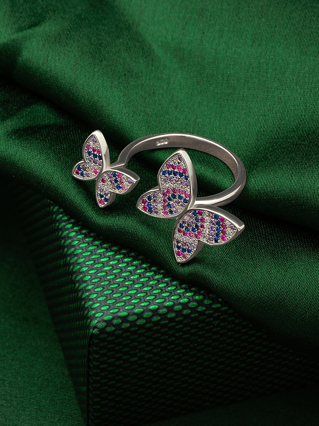SILBERRY 925 Sterling Silver Rhodium-Plated CZ Stone-Studded Barbie Wings Adjustable Finger Ring
SILBERRY 925 Sterling Silver Rhodium-Plated CZ Stone-Studded Barbie Wings Adjustable Finger Ring
