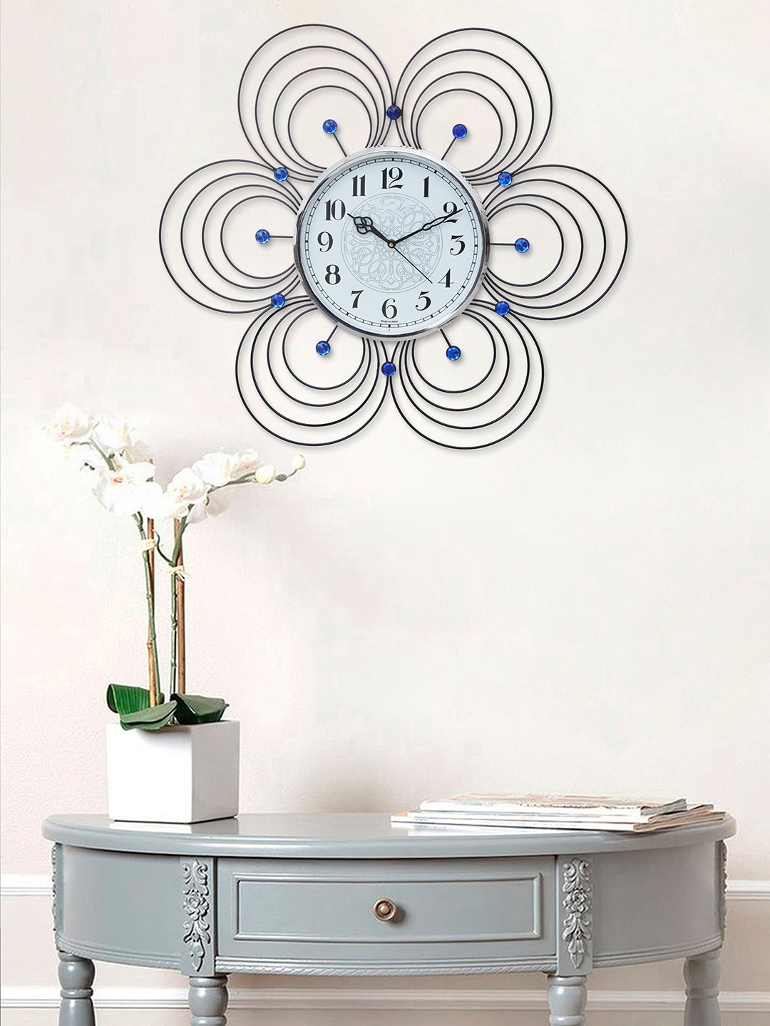 eCraftIndia Black Embellished Floral Analogue Sweep Movement Contemporary Wall Clock
eCraftIndia Black Embellished Floral Analogue Sweep Movement Contemporary Wall Clock