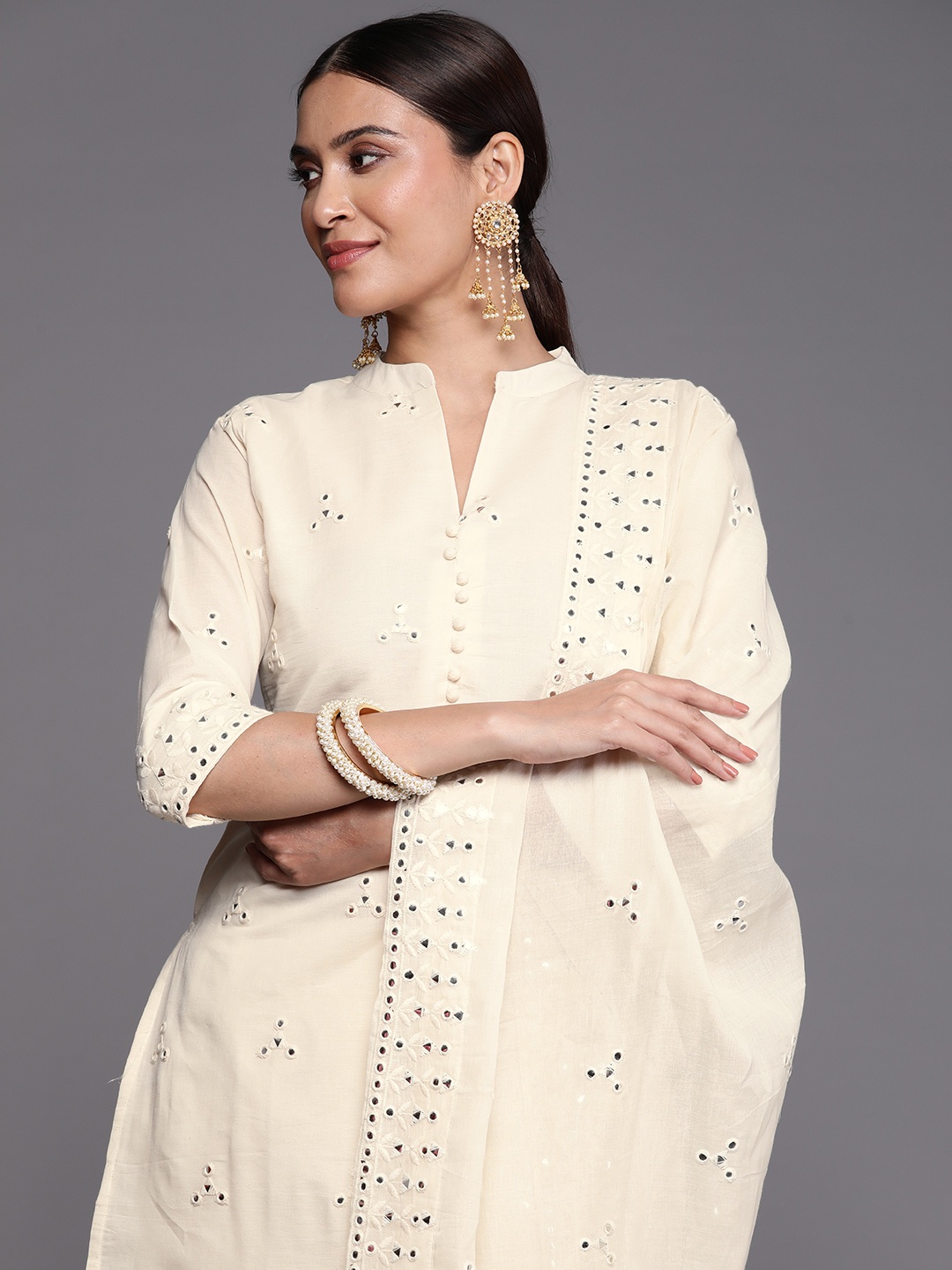 Libas Women Off White Embroidered Regular Mirror Work Pure Cotton Kurta with Trousers & With Dupatta
Libas Women Off White Embroidered Regular Mirror Work Pure Cotton Kurta with Trousers & With Dupatta