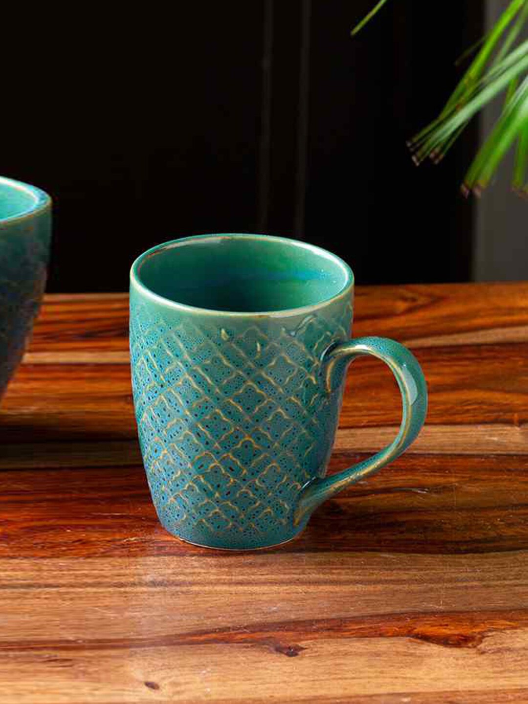 ExclusiveLane Moroccan Turquoise Blue & Gold Toned Textured Ceramic Glossy Mug 300 ml
ExclusiveLane Moroccan Turquoise Blue & Gold Toned Textured Ceramic Glossy Mug 300 ml