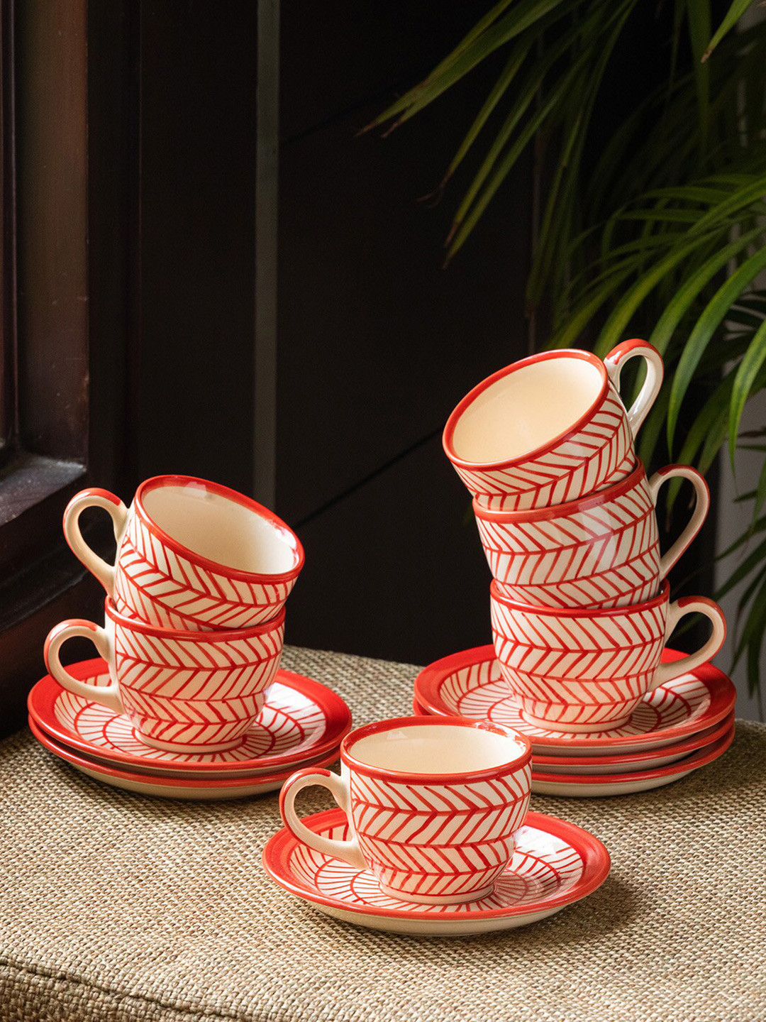 ExclusiveLane Red Chevrons Cream 12 Pcs Printed Ceramic Cups and Saucers 160 ml Each
ExclusiveLane Red Chevrons Cream 12 Pcs Printed Ceramic Cups and Saucers 160 ml Each