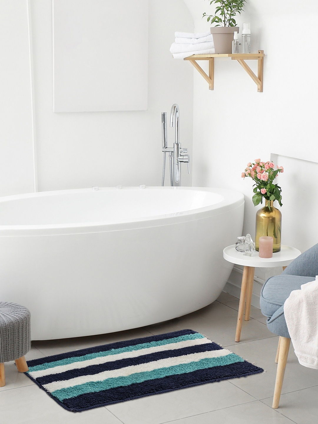 HOMEMONDE Turquoise blue & white 2 Pcs Striped 2000 GSM Anti-Slip Rectangular Bath Rugs
HOMEMONDE Turquoise blue & white 2 Pcs Striped 2000 GSM Anti-Slip Rectangular Bath Rugs