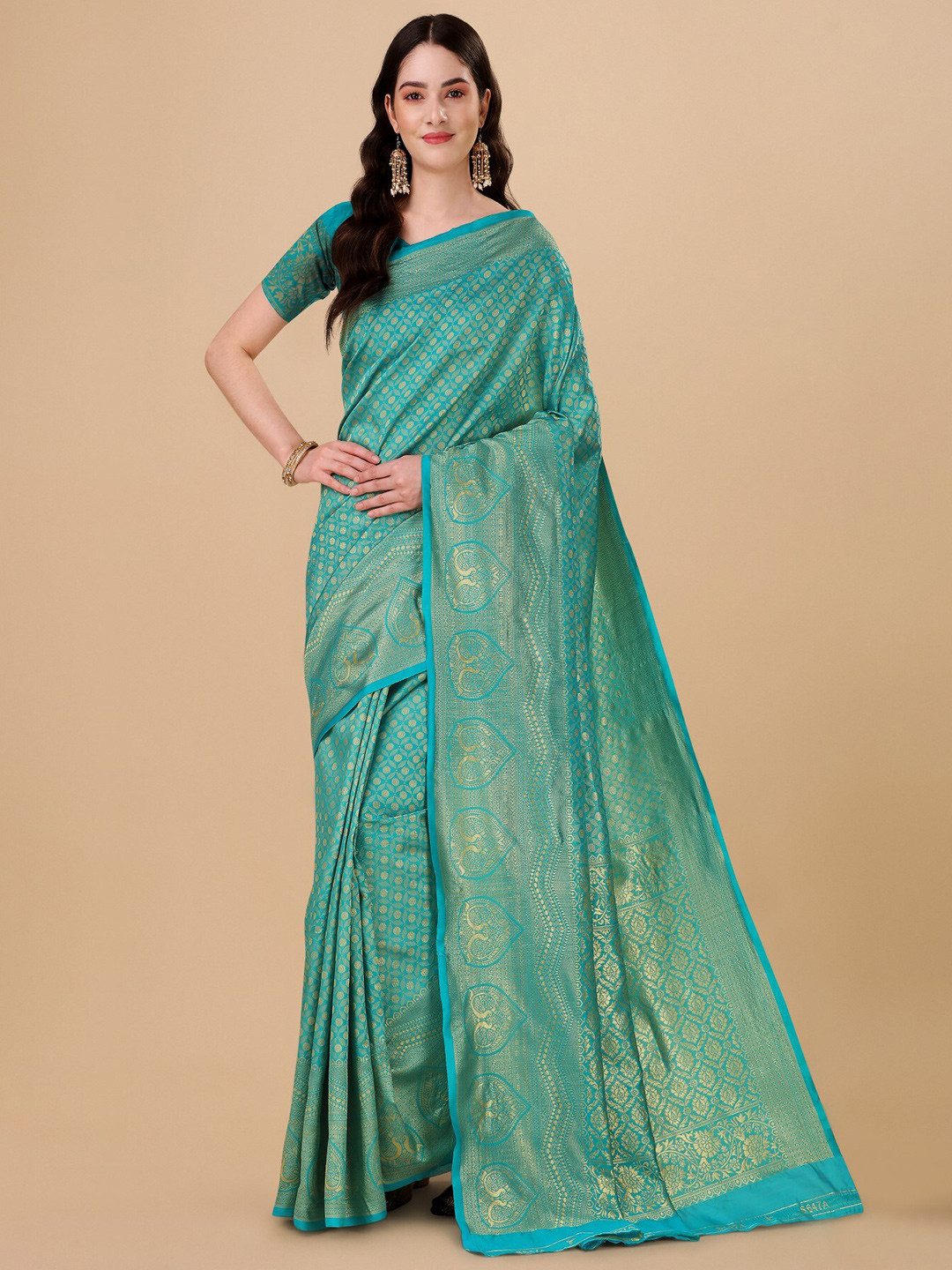 TEREZA Ethnic Motifs Woven Design Zari Kanjeevaram Saree, Turquoise blue 
TEREZA Ethnic Motifs Woven Design Zari Kanjeevaram Saree, Turquoise blue