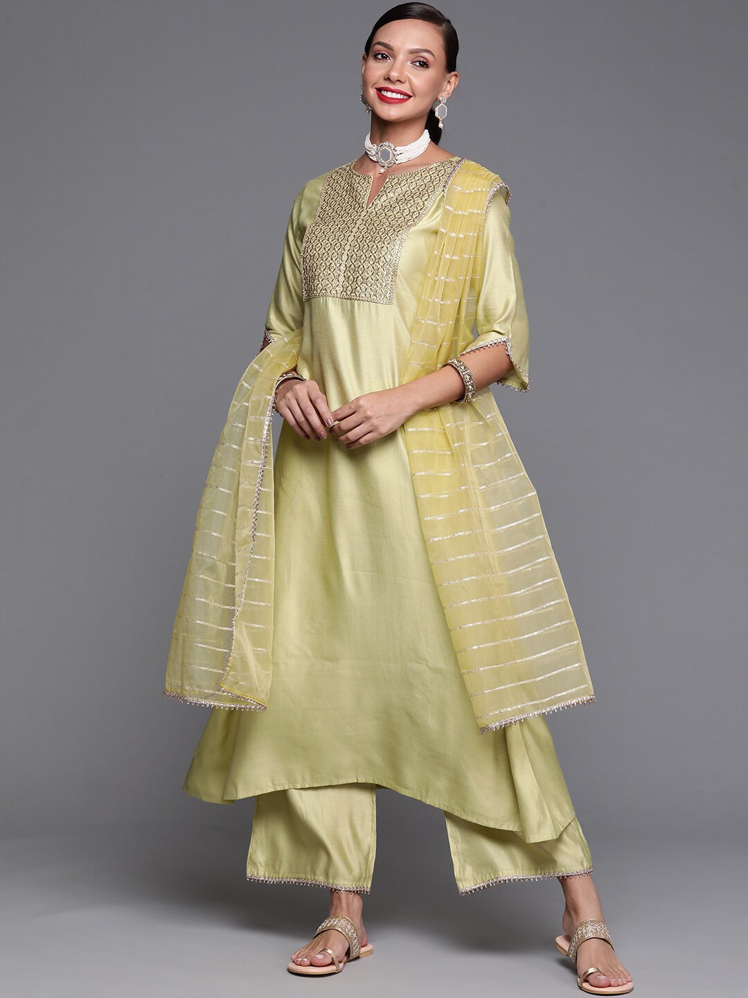 Indo Era Embroidered Notched Collar A-line Kurta with Palazzos & With Dupatta, Lime green
Indo Era Embroidered Notched Collar A-line Kurta with Palazzos & With Dupatta, Lime green