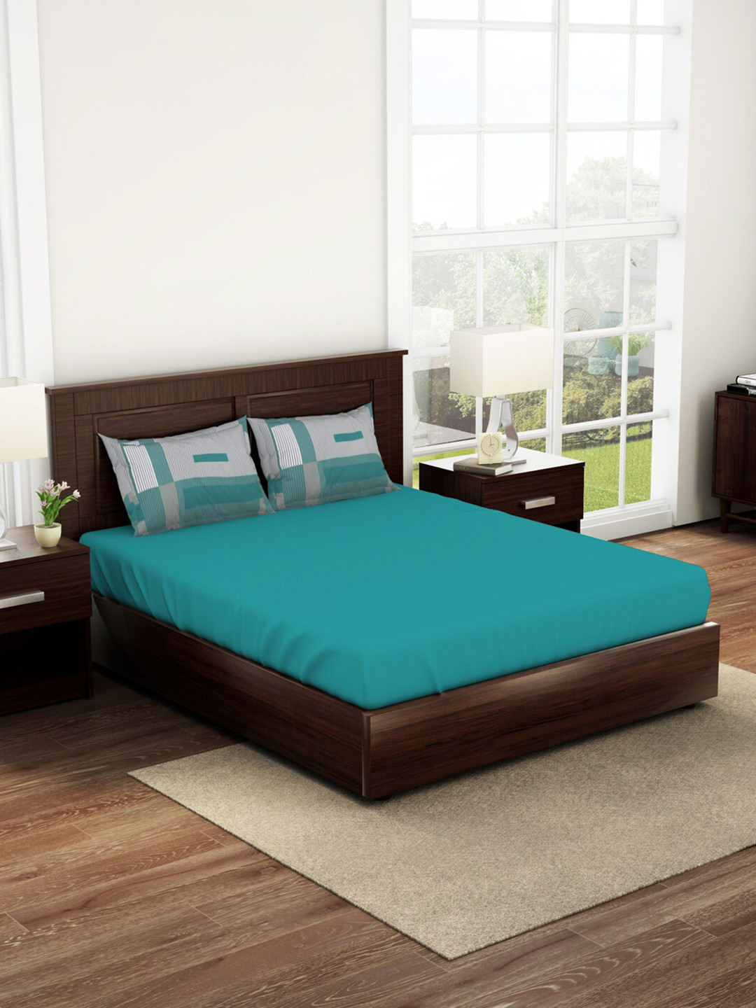 SPACES Geostance Teal & Grey 144 TC Flat Pure Cotton King Bedsheet with 2 Pillow Covers 
SPACES Geostance Teal & Grey 144 TC Flat Pure Cotton King Bedsheet with 2 Pillow Covers