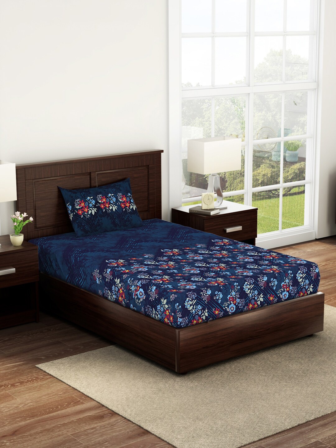 SPACES Bonica Navy Blue & Grey Floral 144 TC Flat Cotton Single Bedsheet & 1 Pillow Cover
SPACES Bonica Navy Blue & Grey Floral 144 TC Flat Cotton Single Bedsheet & 1 Pillow Cover