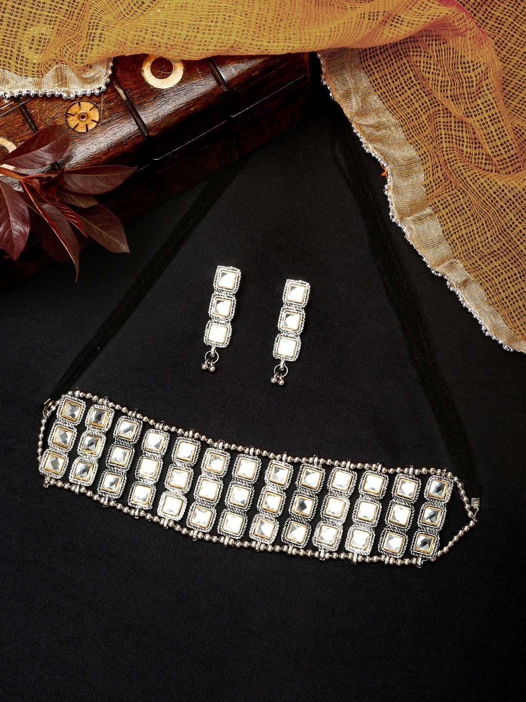 YouBella German Silver-Plated Kundan Stone-Studded & Beaded Choker Jewellery Set, White
YouBella German Silver-Plated Kundan Stone-Studded & Beaded Choker Jewellery Set, White