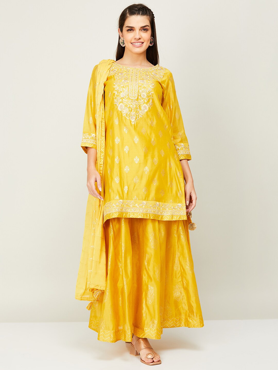 Melange by Lifestyle Women Ethnic Motifs Printed Thread Work Kurta With Skirt & Dupatta, Mustard
Melange by Lifestyle Women Ethnic Motifs Printed Thread Work Kurta With Skirt & Dupatta, Mustard