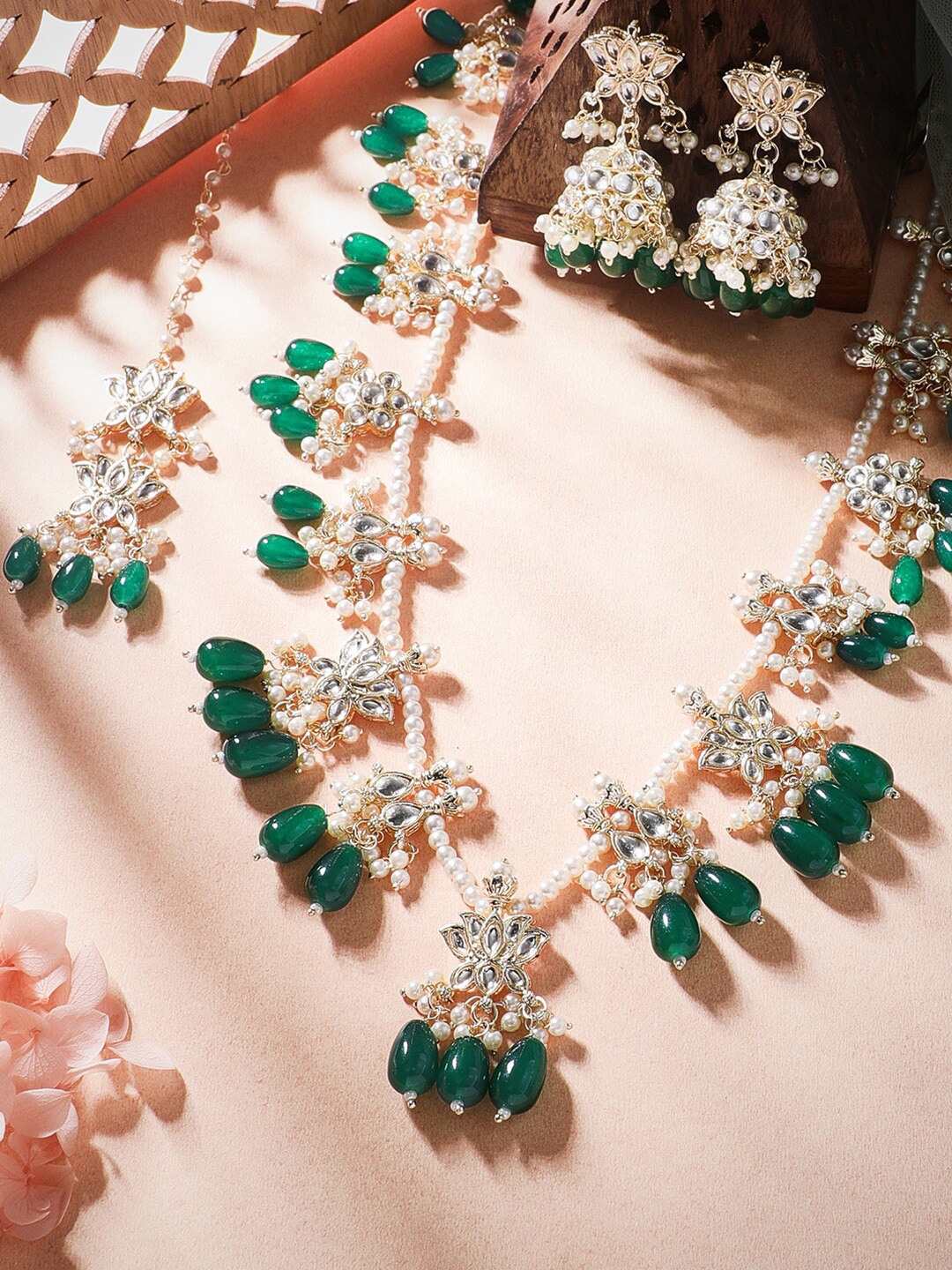 Rubans 22K Gold Plated Kundan Stones Studded Green & White Pearl Beaded Jewellery Set
Rubans 22K Gold Plated Kundan Stones Studded Green & White Pearl Beaded Jewellery Set
