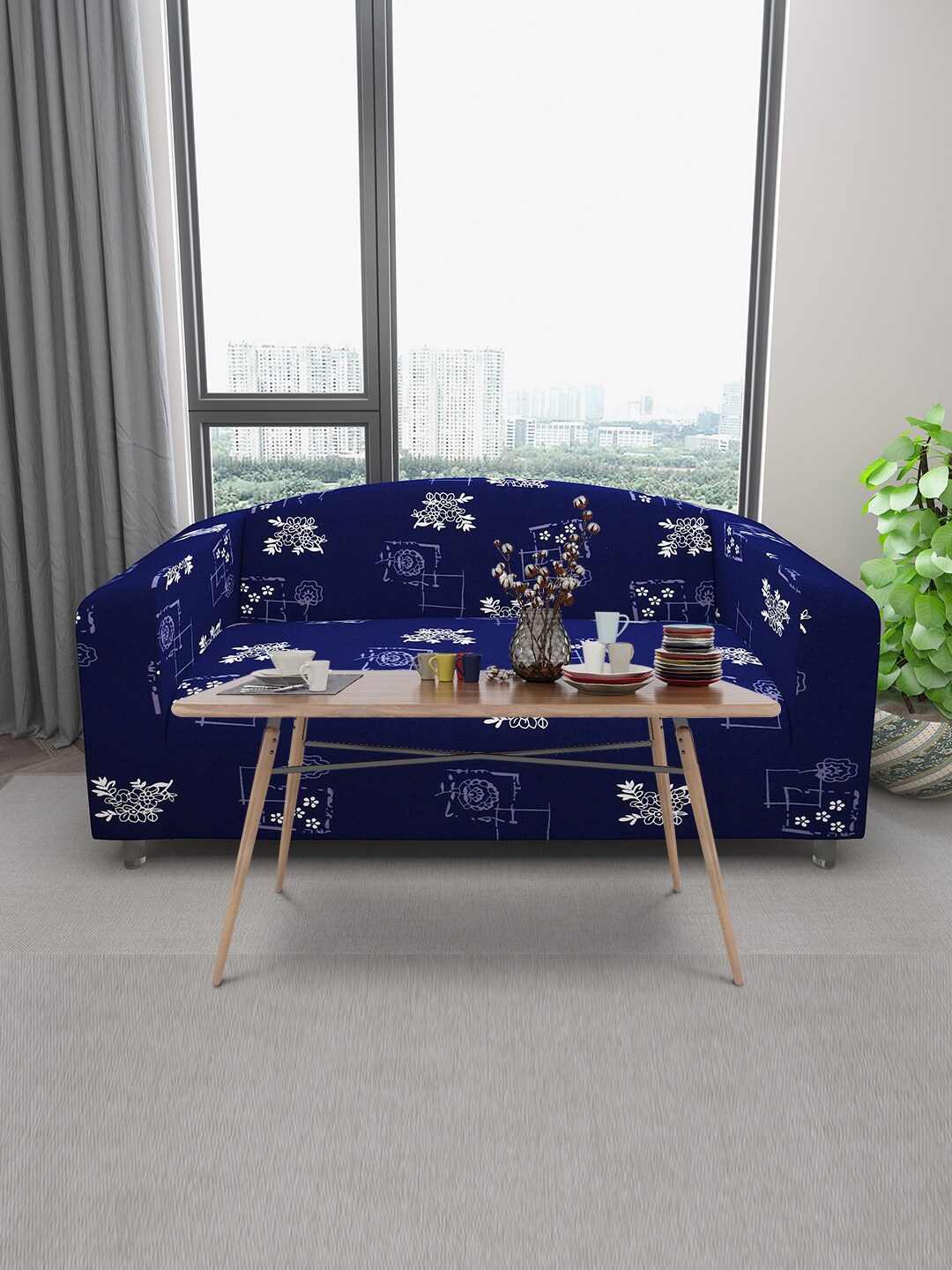 DREAM CARE Blue & White Floral Printed Stretchable 3-Seater Sofa Cover With Anti Slip Foam Sticks
DREAM CARE Blue & White Floral Printed Stretchable 3-Seater Sofa Cover With Anti Slip Foam Sticks