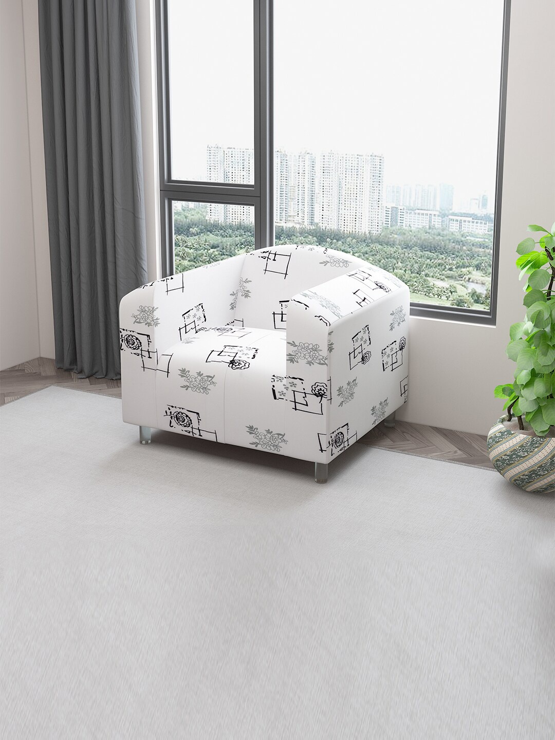 DREAM CARE White & Black Printed Stretchable One Seater Sofa Slipcover With Foam Sticks
DREAM CARE White & Black Printed Stretchable One Seater Sofa Slipcover With Foam Sticks