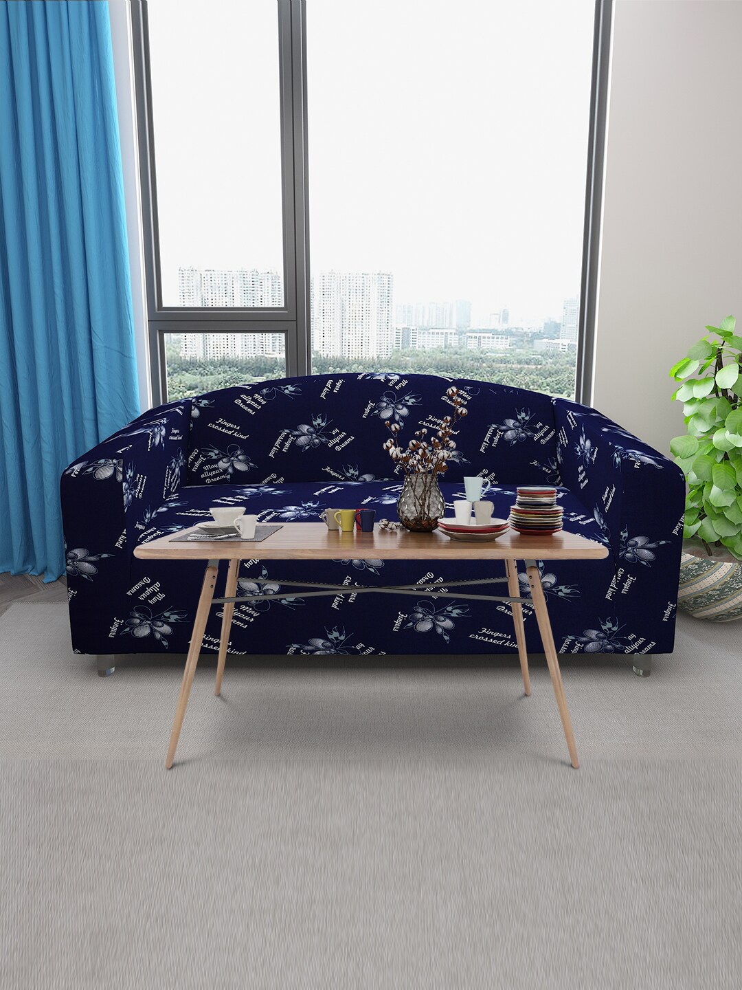 DREAM CARE Navy Blue & Silver-Toned Printed Three Seater Stretchable Sofa Slipcover With Foam Sticks
DREAM CARE Navy Blue & Silver-Toned Printed Three Seater Stretchable Sofa Slipcover With Foam Sticks