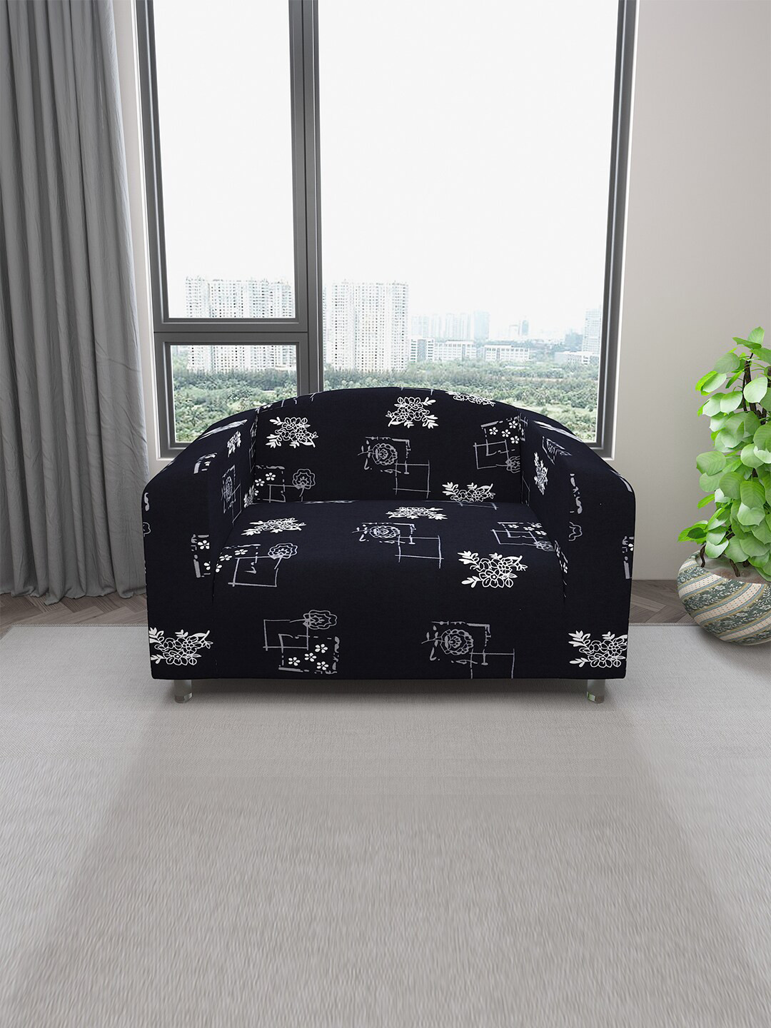 DREAM CARE Black Floral Printed Stretchable 2-Seater Sofa Cover With Anti Slip Foam Sticks
DREAM CARE Black Floral Printed Stretchable 2-Seater Sofa Cover With Anti Slip Foam Sticks