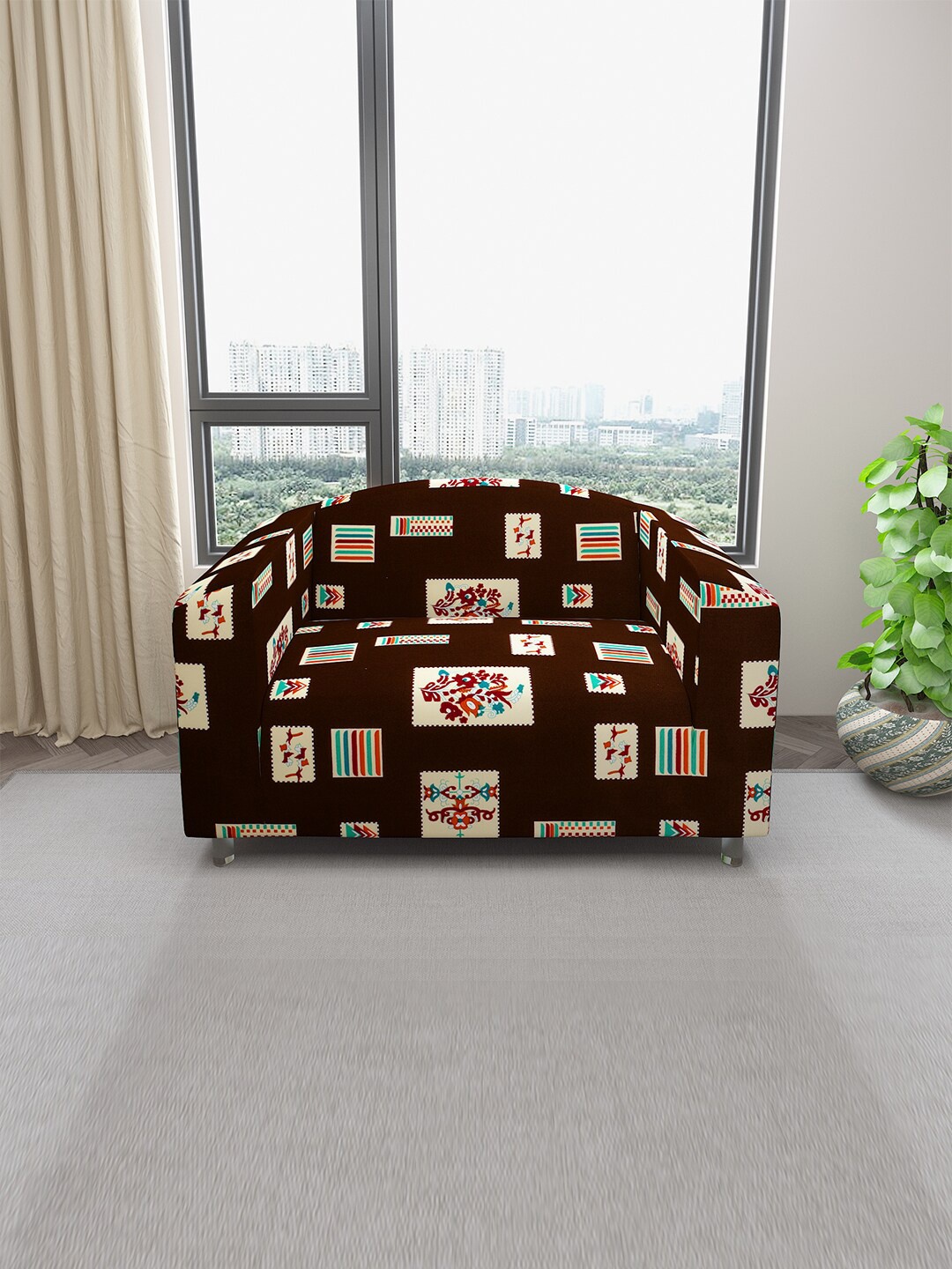 DREAM CARE Brown Floral Printed Stretchable 2-Seater Sofa Cover With Anti Slip Foam Sticks
DREAM CARE Brown Floral Printed Stretchable 2-Seater Sofa Cover With Anti Slip Foam Sticks