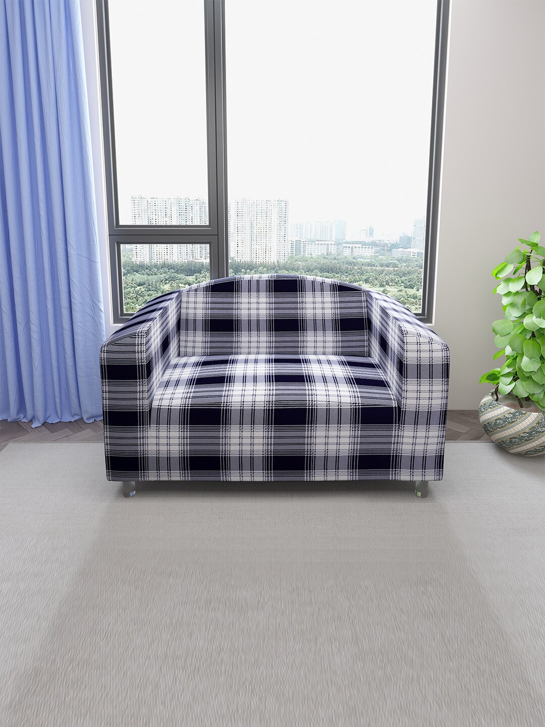 DREAM CARE White & Blue Checked Stretchable 2-Seater Sofa Cover With Anti Slip Foam Sticks
DREAM CARE White & Blue Checked Stretchable 2-Seater Sofa Cover With Anti Slip Foam Sticks