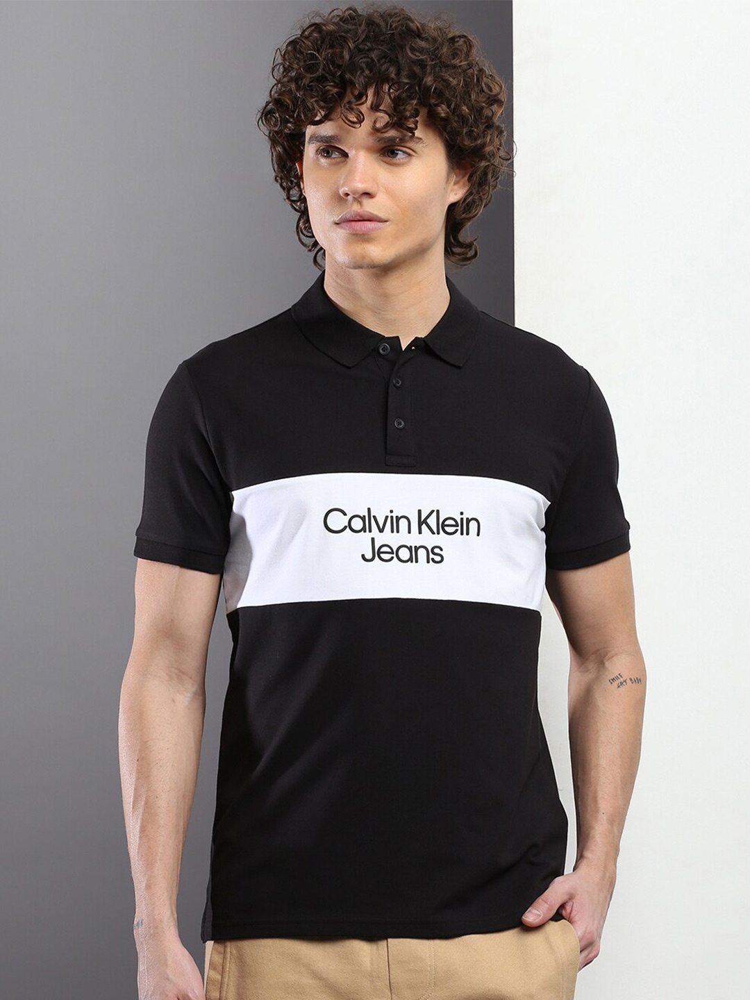 Calvin Klein Jeans Typography Printed Short Sleeve Polo Collar Pure Cotton T-shirt, Black
Calvin Klein Jeans Typography Printed Short Sleeve Polo Collar Pure Cotton T-shirt, Black