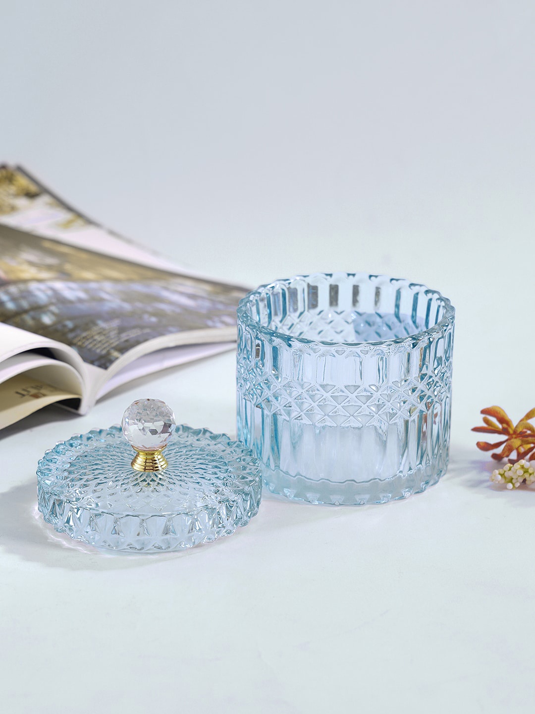 Pure Home and Living Blue & Gold-Toned Diamond Textured Decorative Jar With Crystal Handle
Pure Home and Living Blue & Gold-Toned Diamond Textured Decorative Jar With Crystal Handle