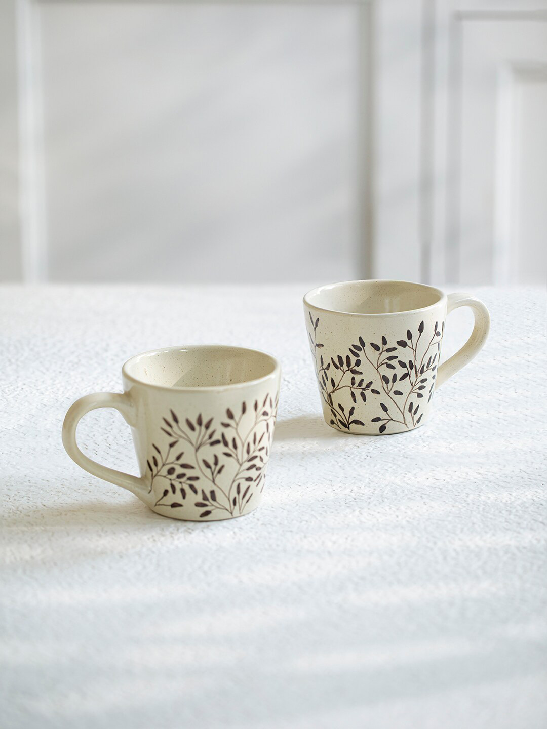 ellementry Off White & Brown 2 Pcs Floral Printed Ceramic Glossy Mugs 250 ml Each
ellementry Off White & Brown 2 Pcs Floral Printed Ceramic Glossy Mugs 250 ml Each
