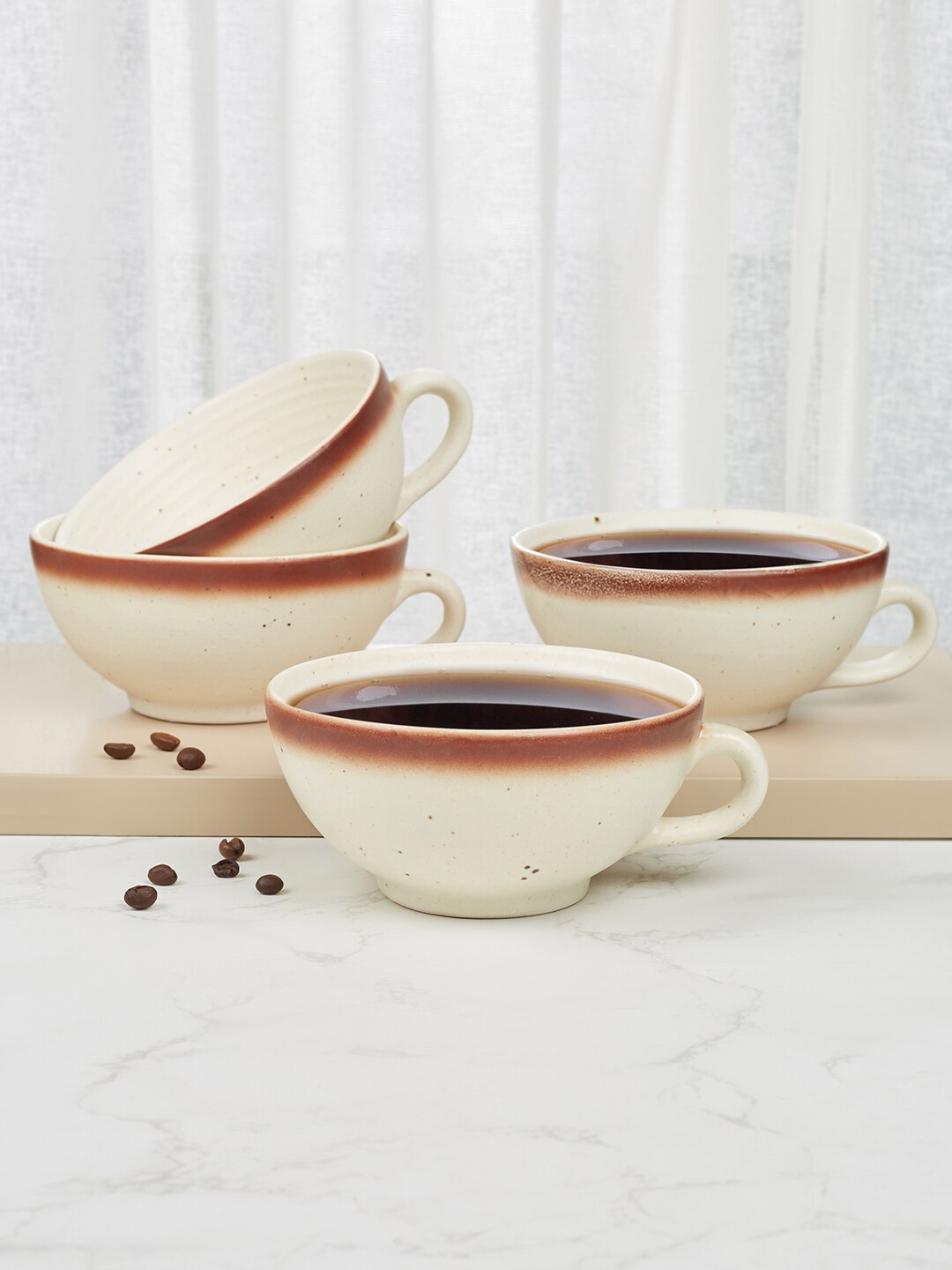 HomeTown Beautiful Kitchen Beige & Off White 4 Pieces Printed Stoneware Mugs 300 ml Each
HomeTown Beautiful Kitchen Beige & Off White 4 Pieces Printed Stoneware Mugs 300 ml Each