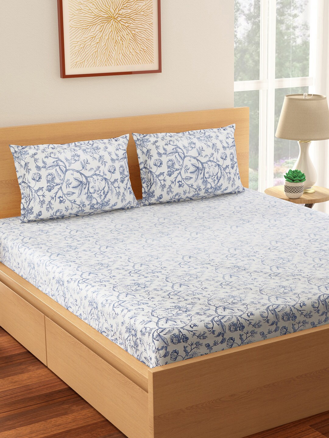 Living scapes by Pantaloons Blue & White Printed 144 TC King Bedsheet & 2 Pillow Covers
Living scapes by Pantaloons Blue & White Printed 144 TC King Bedsheet & 2 Pillow Covers