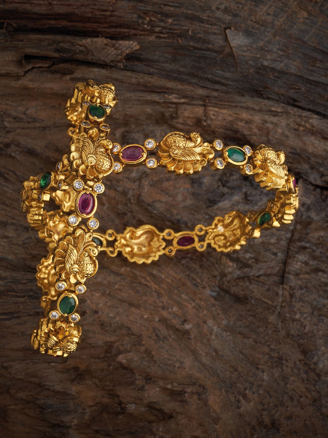 Kushal's Fashion Jewellery Set Of 2 Gold-Plated Stone-Studded Antique Bangles, Red
Kushal's Fashion Jewellery Set Of 2 Gold-Plated Stone-Studded Antique Bangles, Red