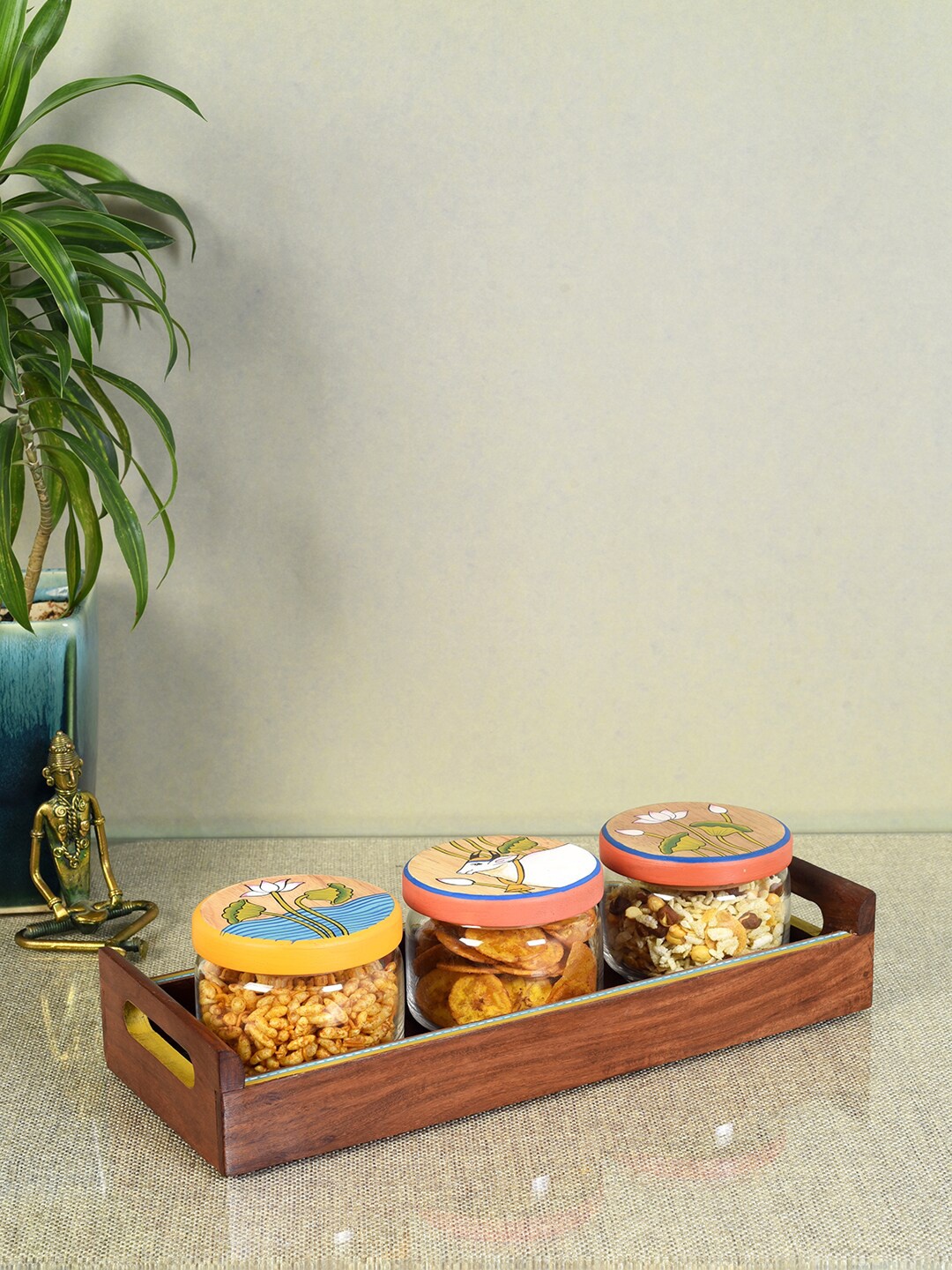 AAKRITI ART CREATIONS Pichhwai Leela 4-Pcs Brown & Transparent Glass Storage Jars & Tray
AAKRITI ART CREATIONS Pichhwai Leela 4-Pcs Brown & Transparent Glass Storage Jars & Tray