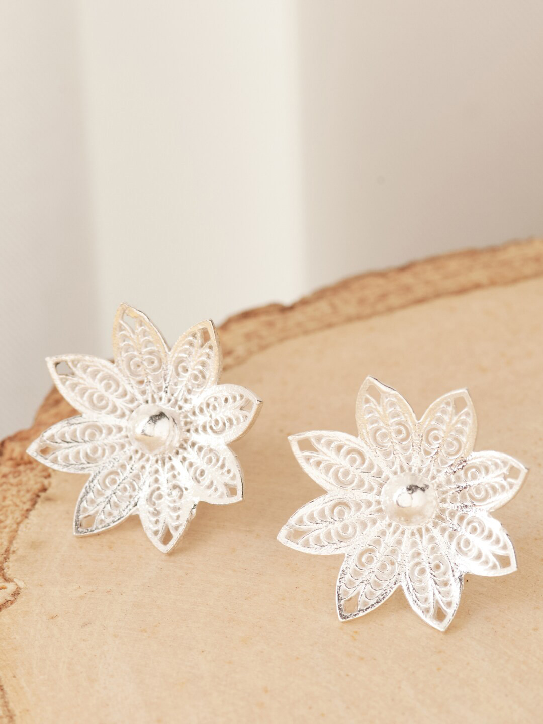 Fabindia Silver-Plated Floral Studs Earrings
Fabindia Silver-Plated Floral Studs Earrings