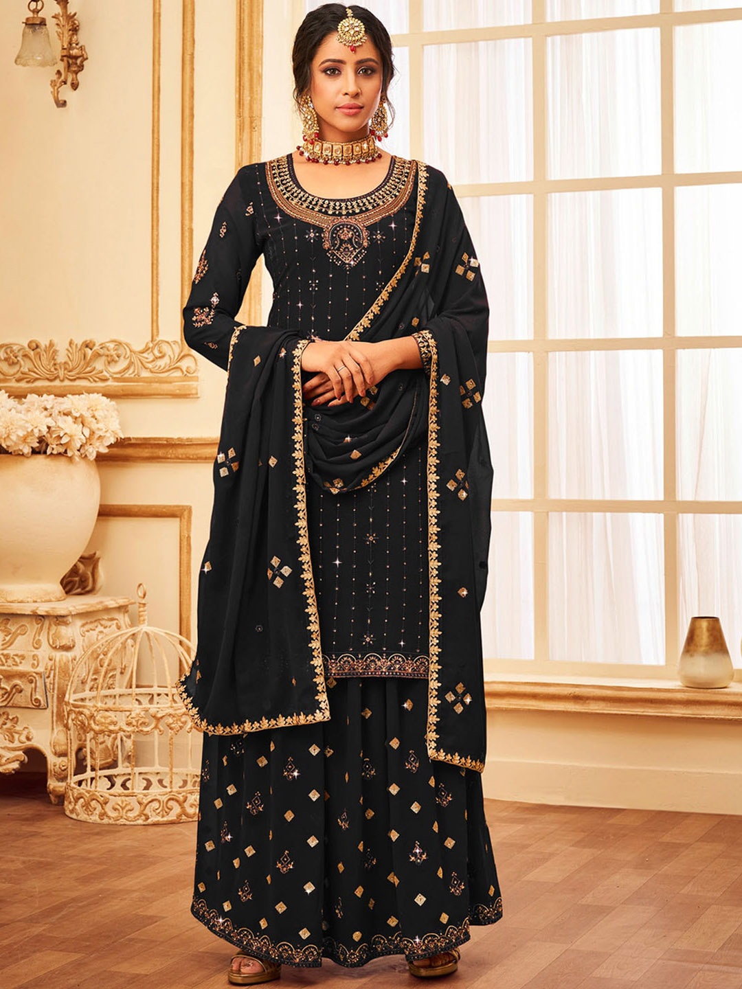 ODETTE Women Black Ethnic Motifs Embroidered Thread Work Kurta with Skirt & With Dupatta
ODETTE Women Black Ethnic Motifs Embroidered Thread Work Kurta with Skirt & With Dupatta