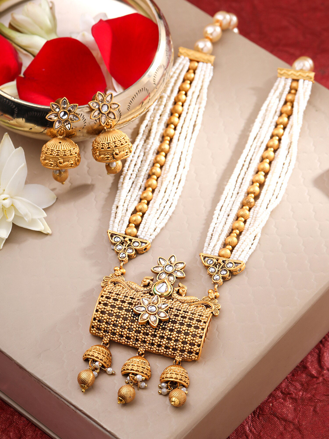 Yellow Chimes Gold plated Peacock design Broad peral beadded Long Jeweller Set, White
Yellow Chimes Gold plated Peacock design Broad peral beadded Long Jeweller Set, White