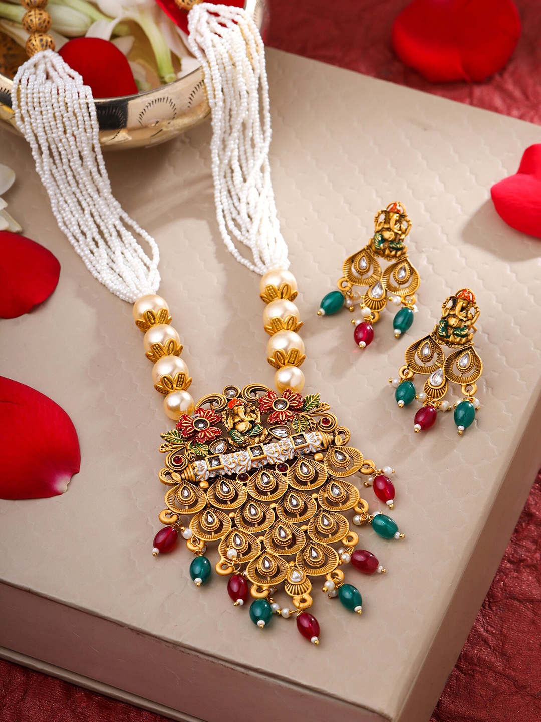 Yellow Chimes Gold Plated Pearl Beaded Lord Ganesh Ji Designed Jewellery Set, White
Yellow Chimes Gold Plated Pearl Beaded Lord Ganesh Ji Designed Jewellery Set, White